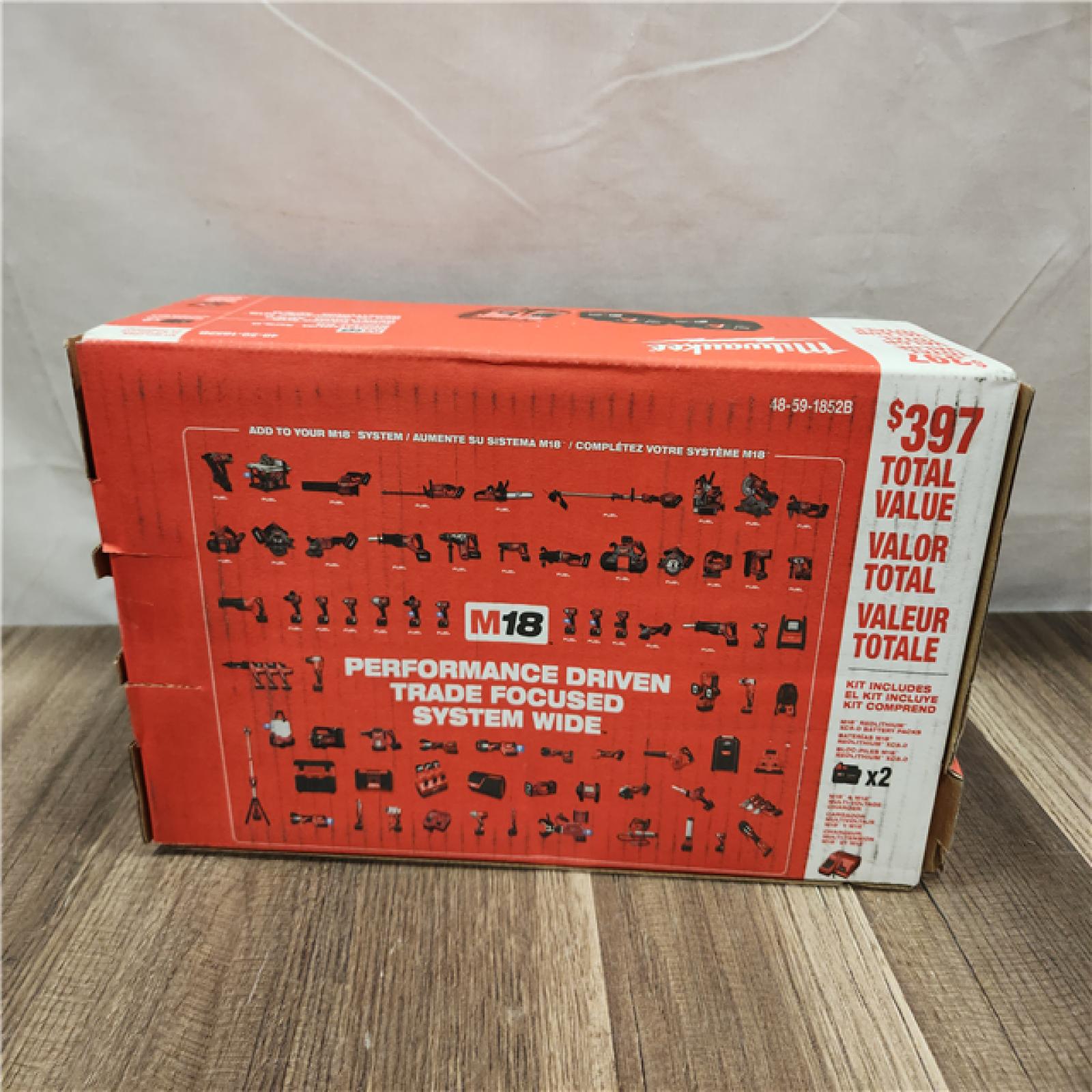 NEW- M18 18-Volt Lithium-Ion XC Starter Kit with Two 5.0Ah Batteries and Charger