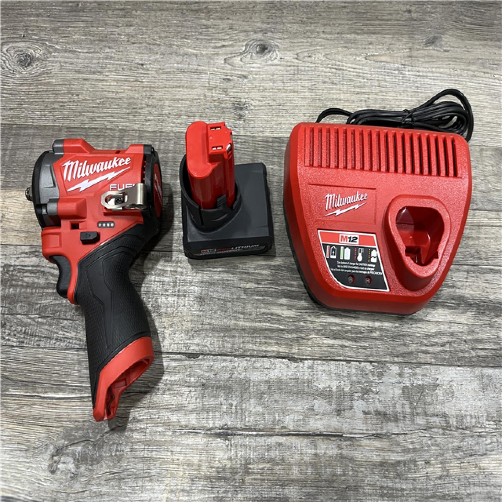 AS-IS Milwaukee FUEL 12V Li-Ion Brushless Cordless Stubby 3/8 in. Impact Wrench Kit