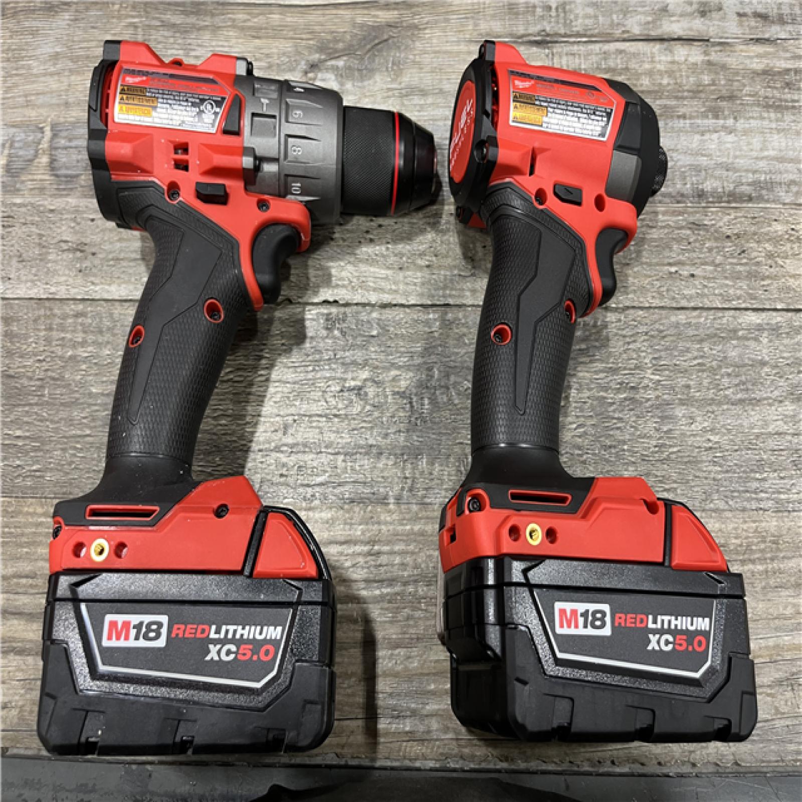 AS-IS Milwaukee FUEL 18V Lithium-Ion Brushless Cordless Hammer Drill and Impact Driver Combo Kit
