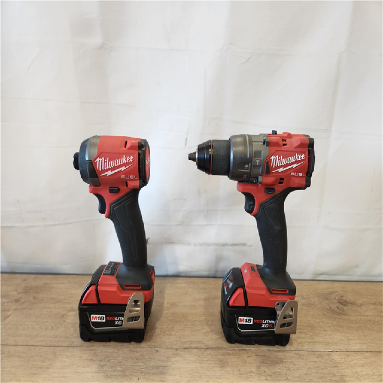 AS-IS- Milwaukee FUEL 18V Lithium-Ion Brushless Cordless Hammer Drill and Impact Driver Combo Kit