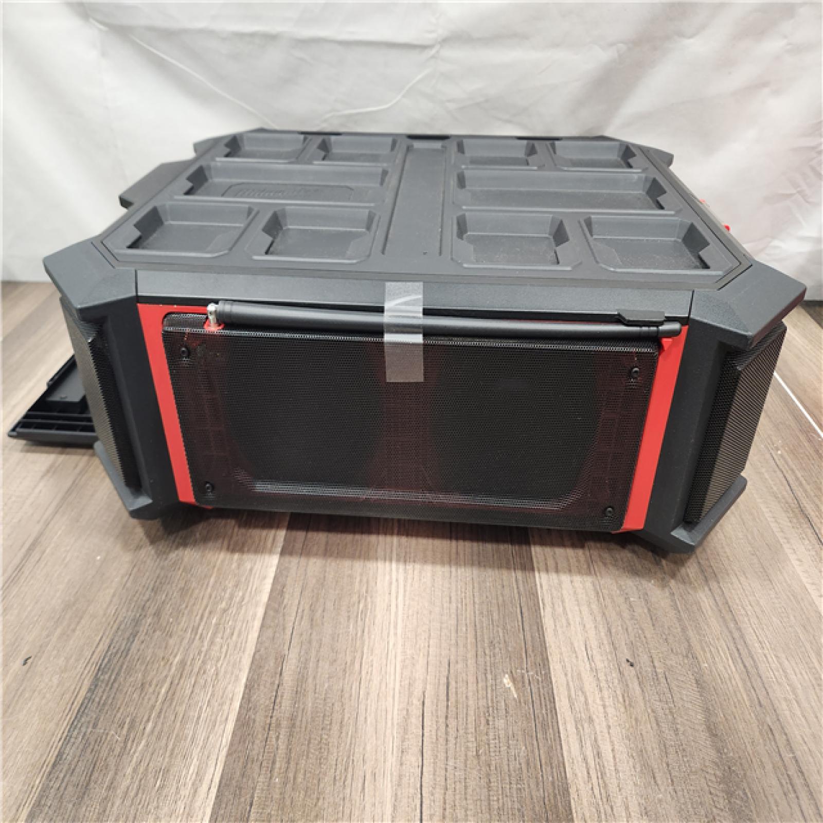 AS-IS- Milwaukee 18V M18 PACKOUT Lithium-Ion Cordless Radio + Charger (Tool Only)