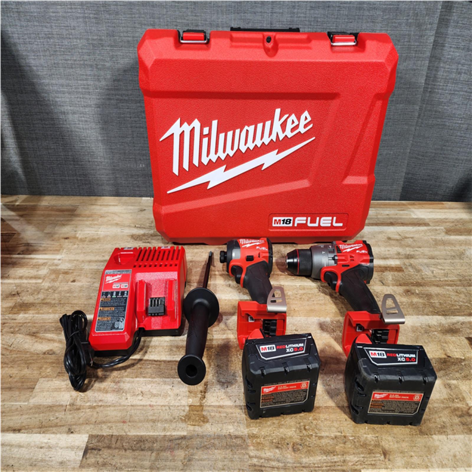 Houston Location AS-IS Milwaukee FUEL 18V Lithium-Ion Brushless Cordless Hammer Drill and Impact Driver Combo Kit