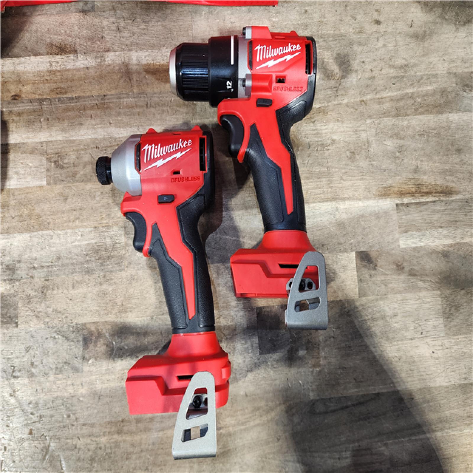 HOUSTON LOCATION - AS-IS Milwaukee M18 18V Lithium-Ion Brushless Cordless Compact Drill/Impact Combo Kit (2-Tool) W/(2) 2.0 Ah Batteries  Charger & Bag