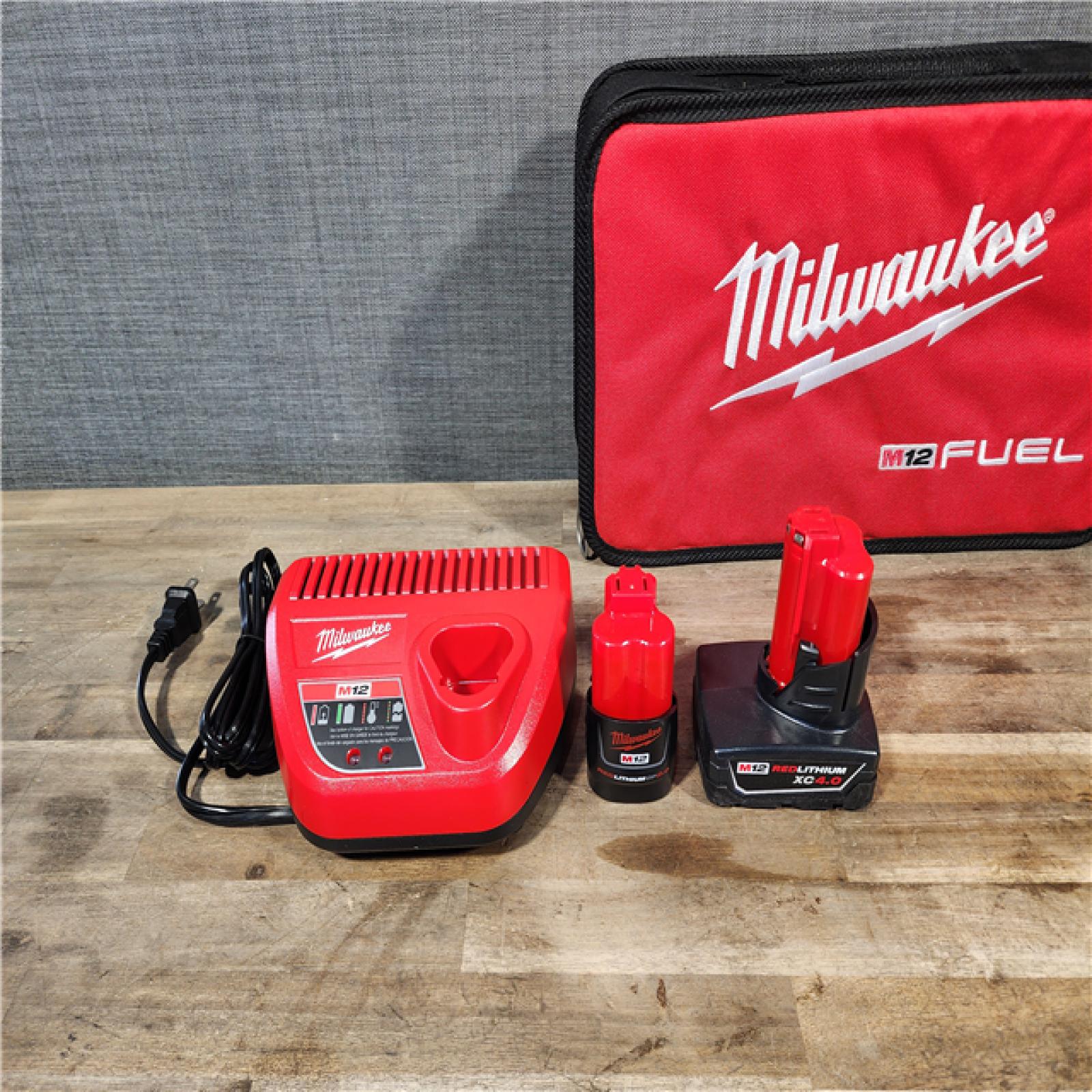 HOUSTON LOCATION - AS-IS Milwaukee 3497-22 12V Brushless Hammer Drill and Impact Driver Combo Kit