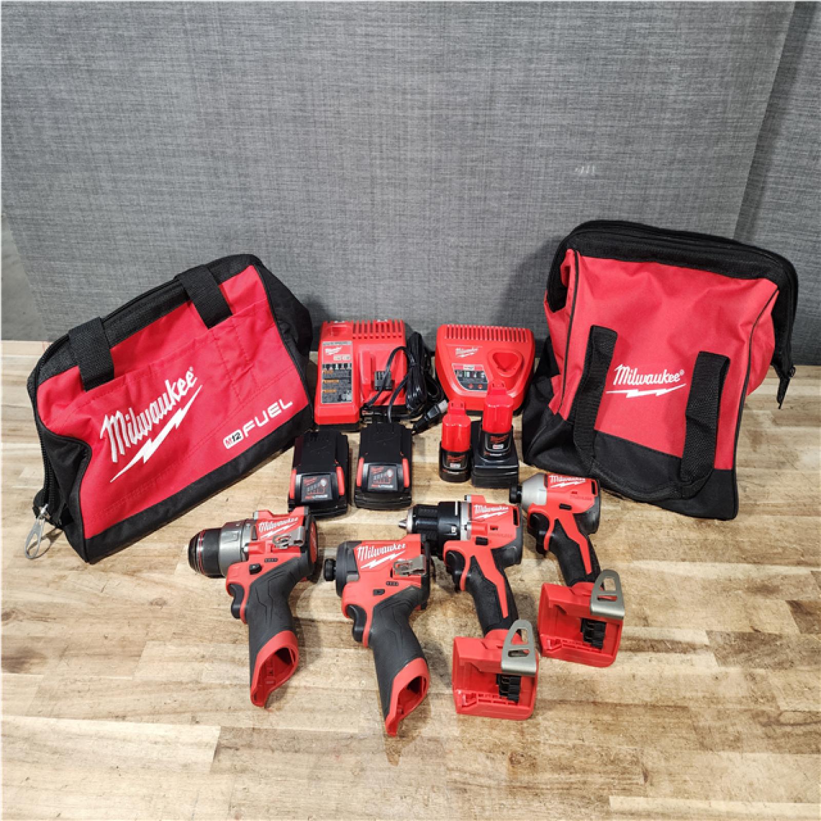 Houston Location AS-IS Milwaukee Drills QTY/4 and Batteries QTY/4 with Chargers QTY/2