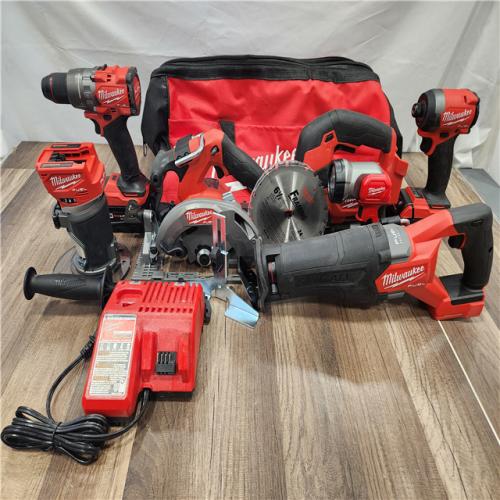 AS-IS- Good - M18 FUEL 18V Lithium-Ion Brushless Cordless Combo Kit  with Two 5.0 Ah Batteries  1 Charger 1 Tool Bag