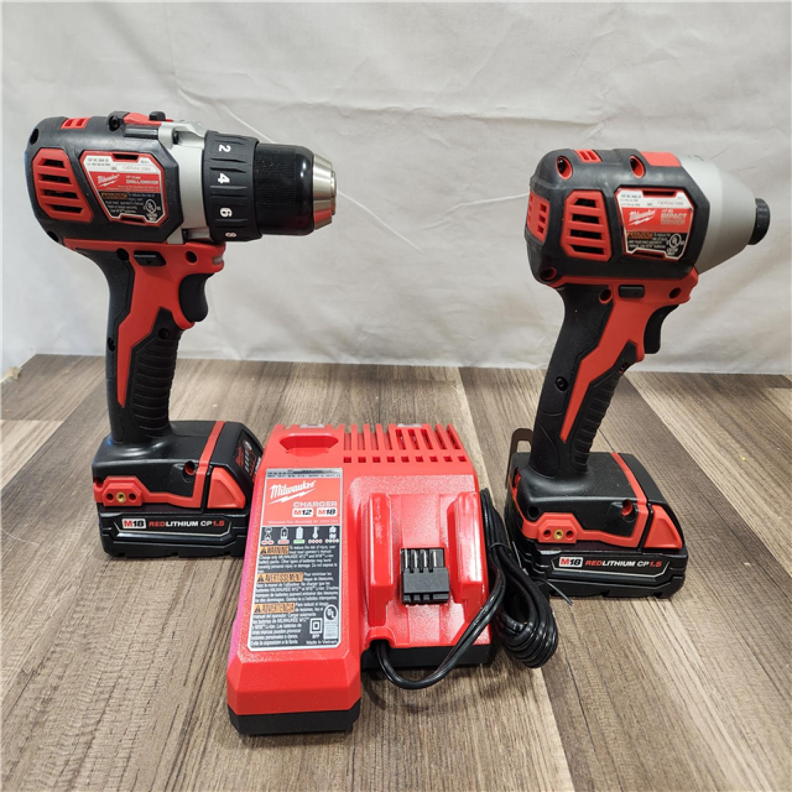 AS-IS- Milwaukee 18V Cordless Brushed 2-Tool Drill/Driver and Impact Driver Kit