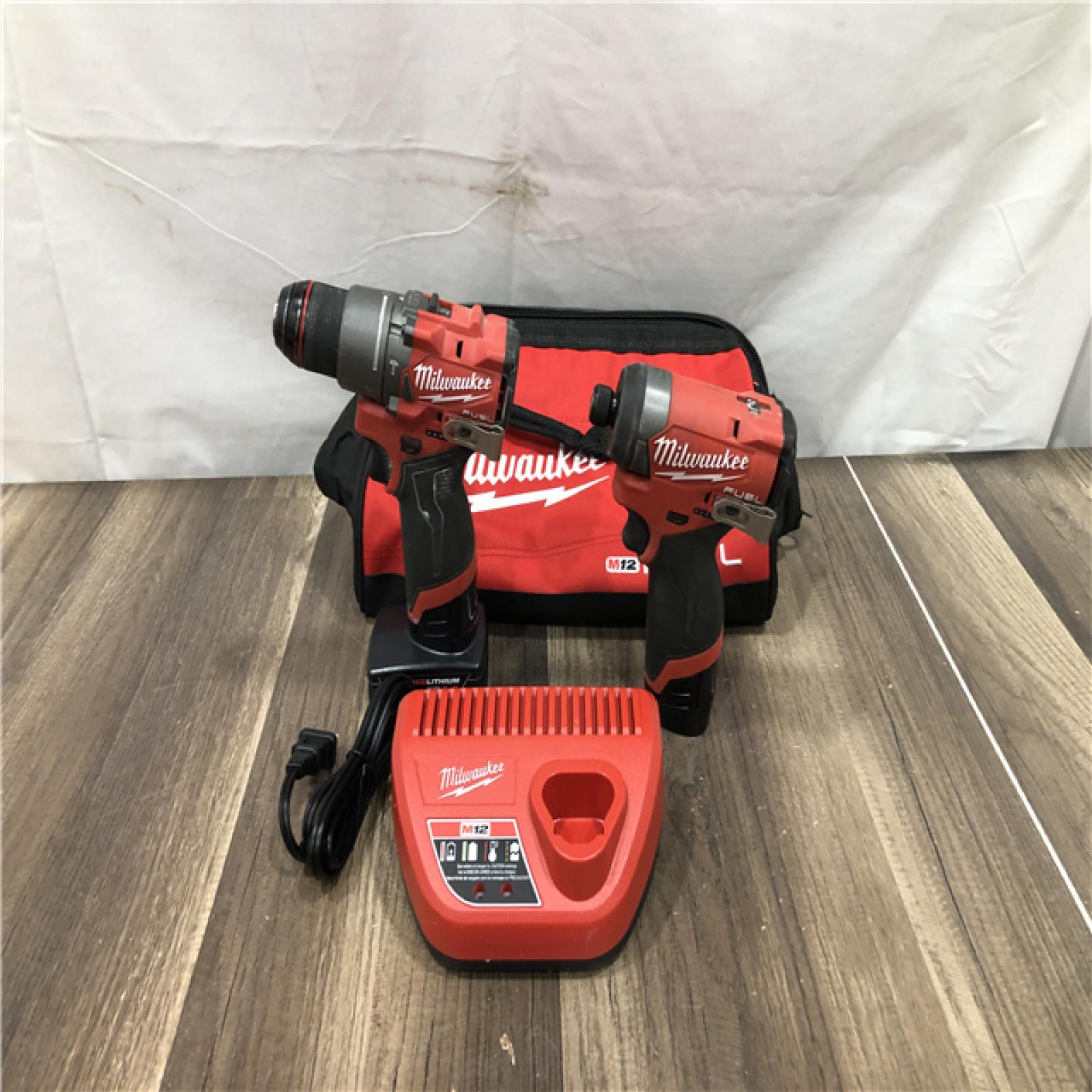 AS-IS Milwaukee FUEL 12-Volt Lithium-Ion Brushless Cordless Hammer Drill and Impact Driver Combo Kit