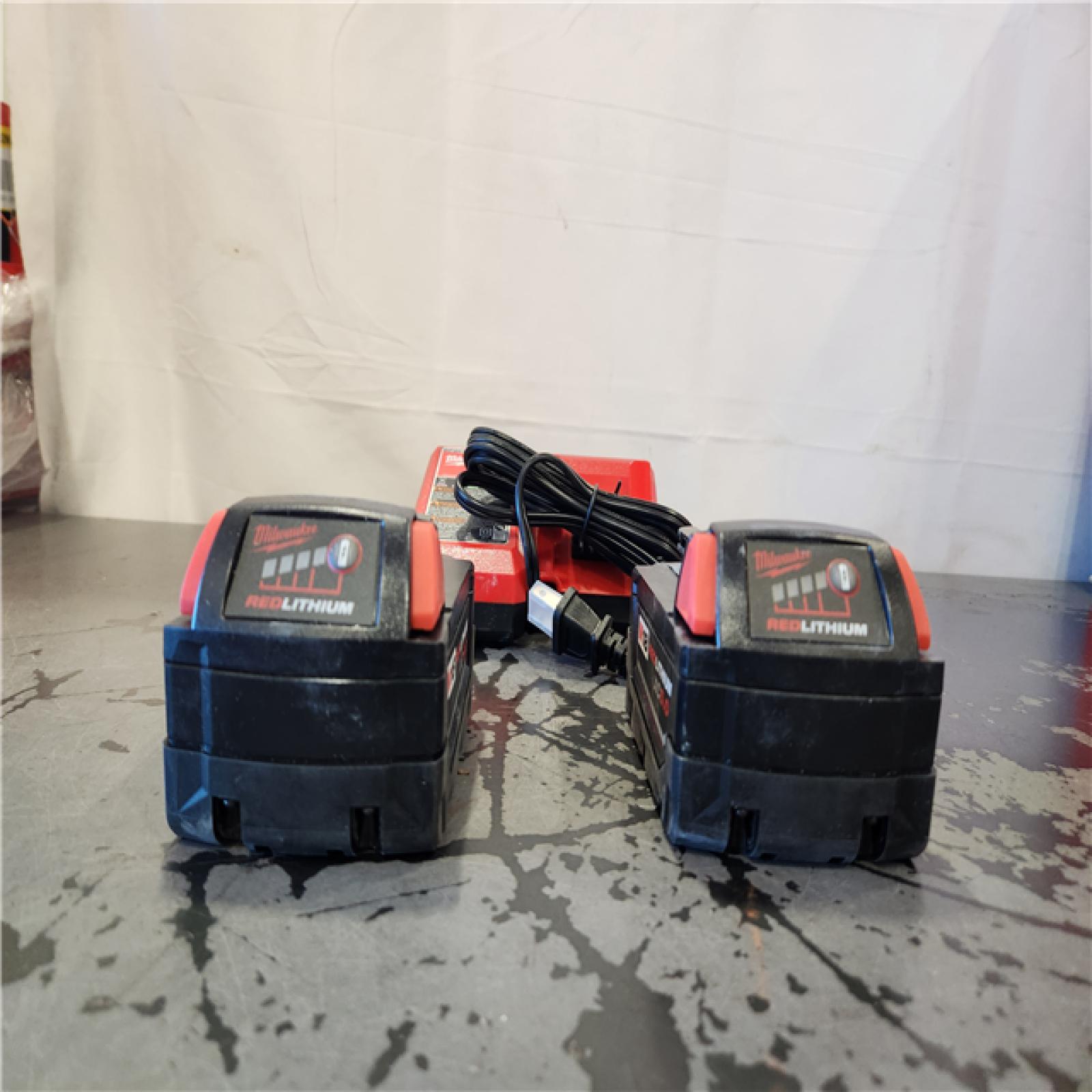 AS-IS- Milwaukee 18-Volt Lithium-Ion XC Starter Kit with Two 5.0Ah Batteries and Charger