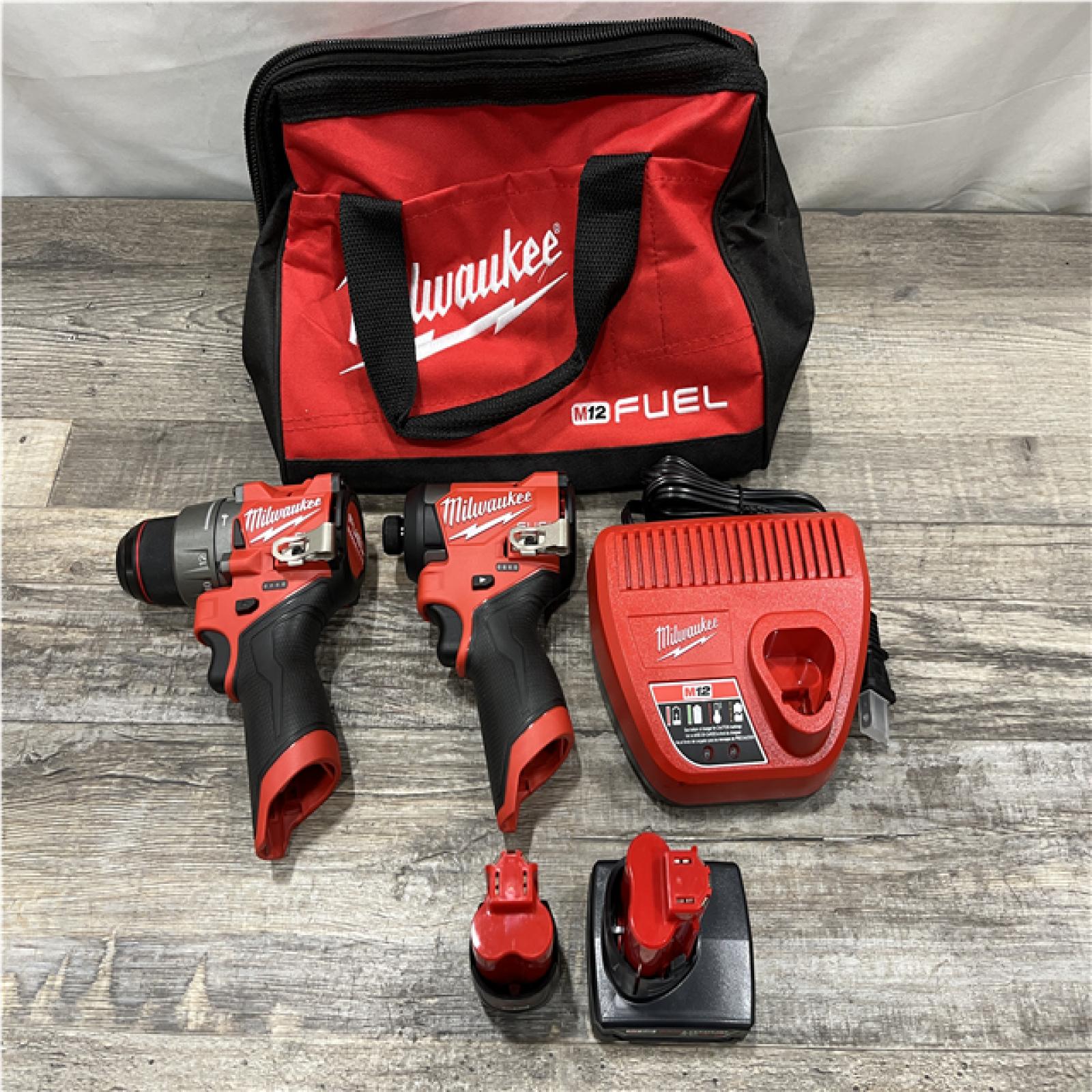 AS-IS Milwaukee FUEL 12-Volt Lithium-Ion Brushless Cordless Hammer Drill and Impact Driver Combo Kit