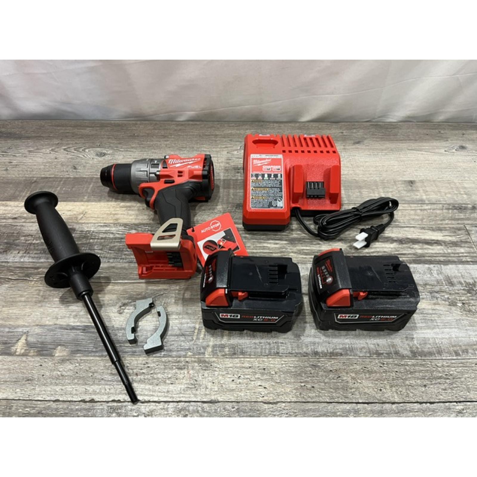 AS-IS Milwaukee FUEL 18V Lithium-Ion Brushless Cordless 1/2 in. Hammer Drill Driver Kit