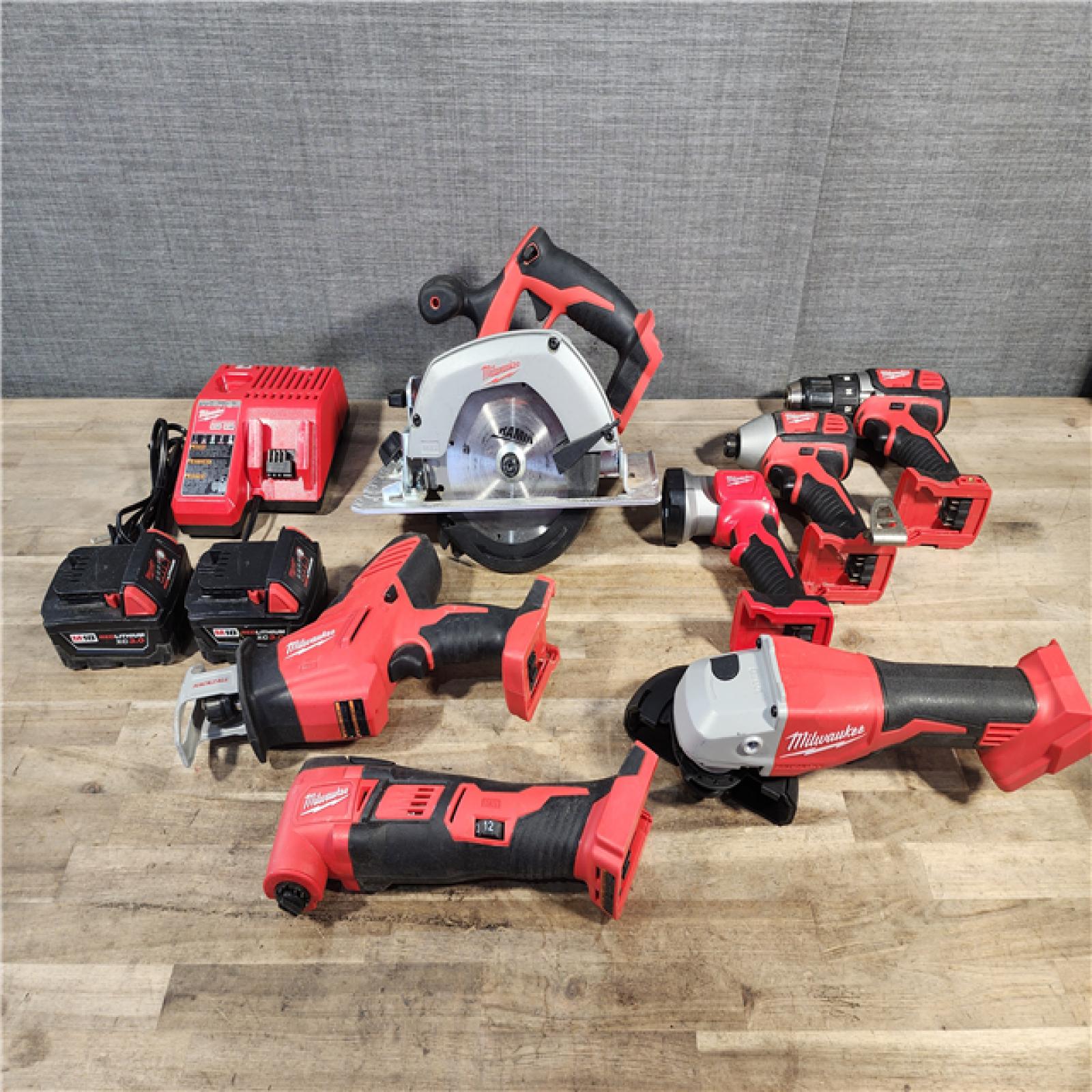 HOUSTON LOCATION - AS-IS Milwaukee M18 18-Volt Lithium-Ion Cordless Combo Kit 7-Tool with 2-Batteries, Charger