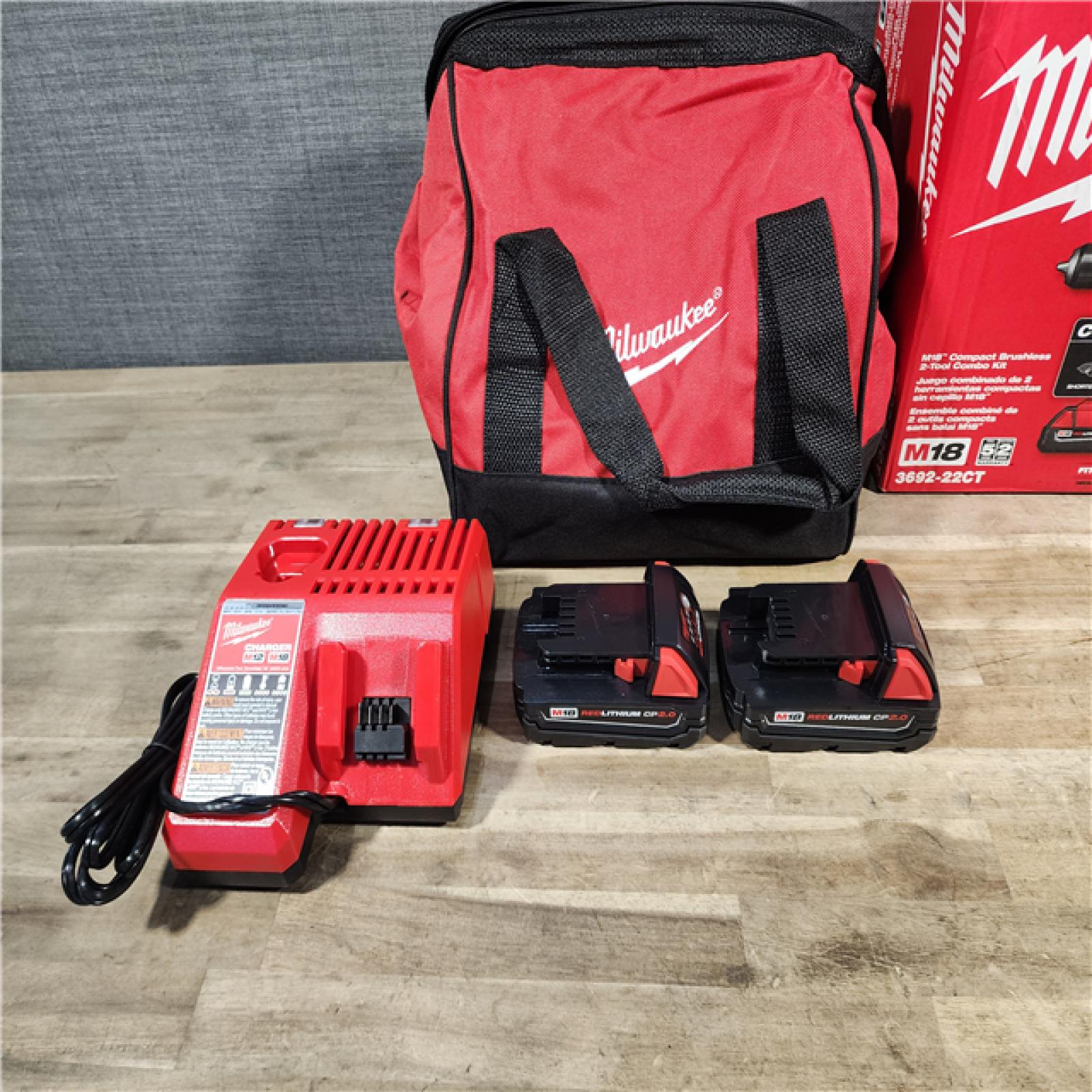 HOUSTON LOCATION - AS-IS Milwaukee M18 18V Lithium-Ion Brushless Cordless Compact Drill/Impact Combo Kit (2-Tool) W/(2) 2.0 Ah Batteries, Charger & Bag