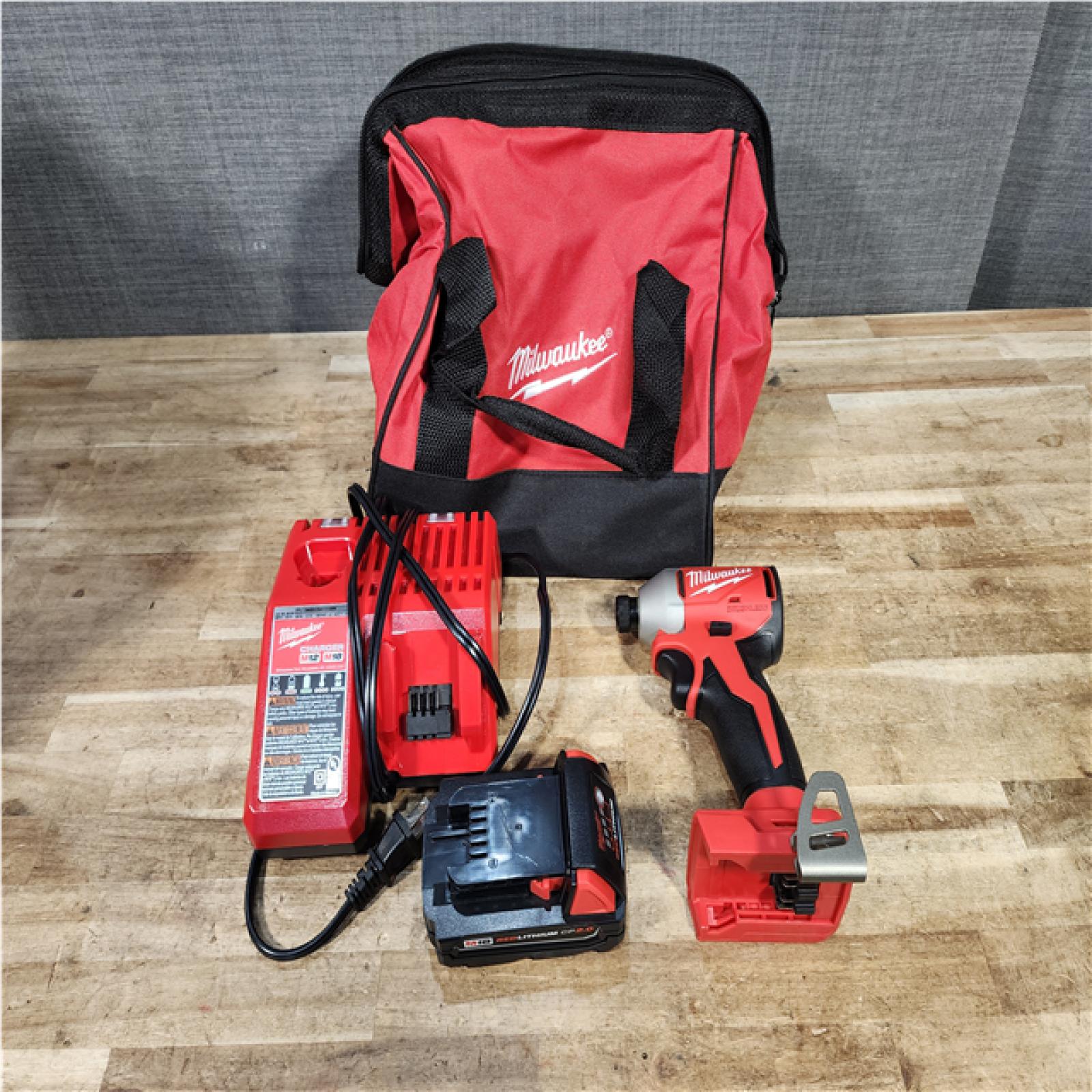 Houston Location AS-IS Milwaukee 18-Volt Lithium-Ion Compact Brushless Cordless 1/4 in. Impact Driver Kit