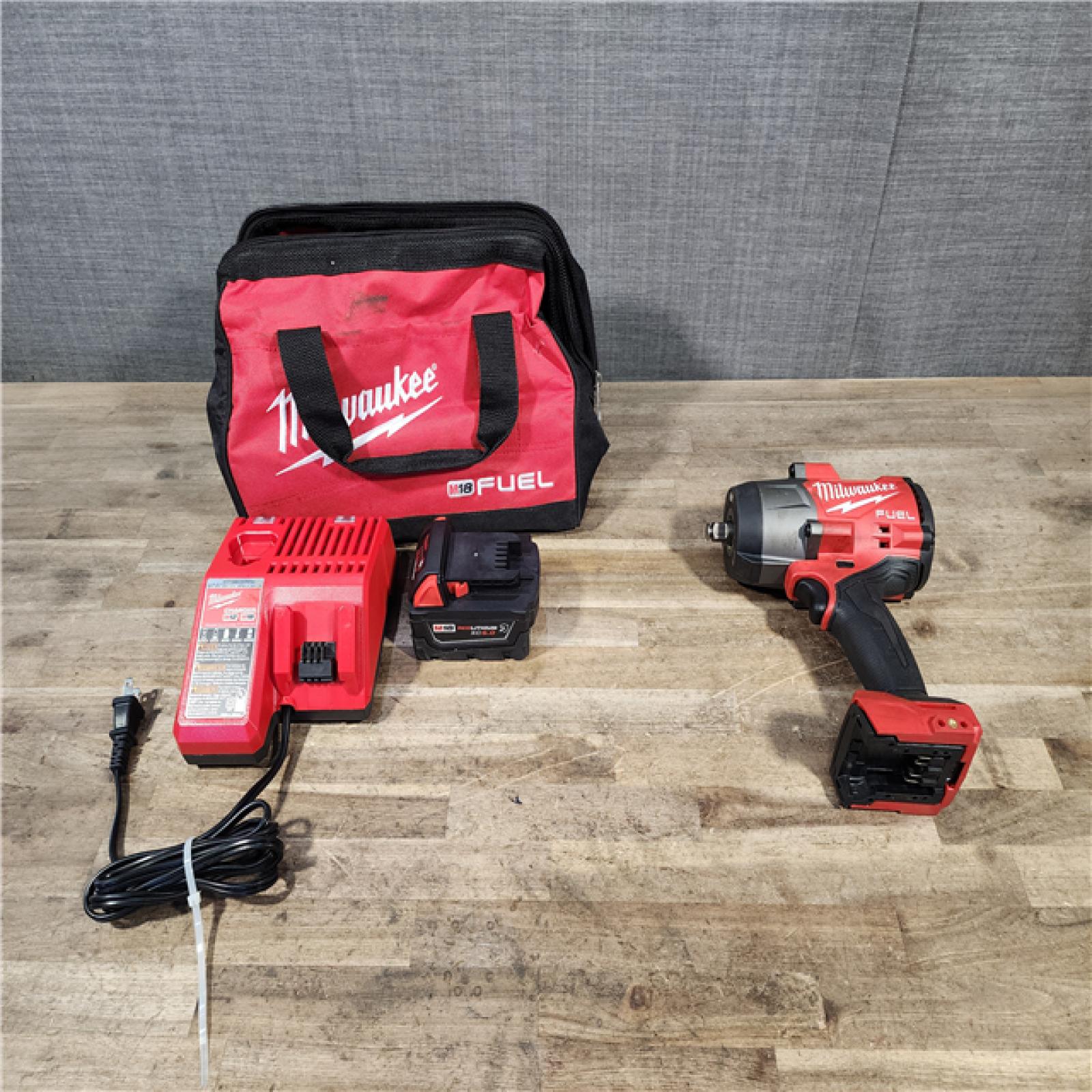 HOUSTON LOCATION - AS-IS Milwaukee M18 1/2 in. Cordless Brushless High Torque Impact Wrench Kit (Battery & Charger)