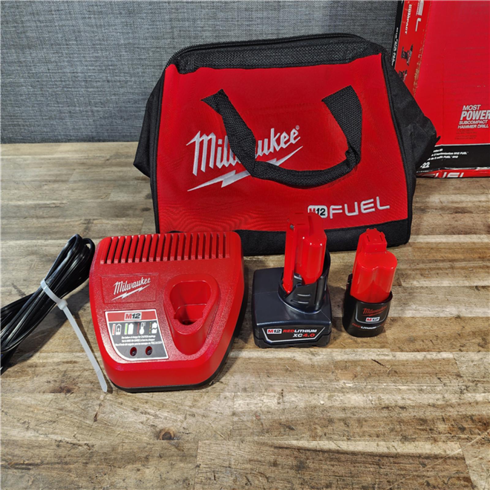 HOUSTON LOCATION - AS-IS Milwaukee FUEL 12-Volt Lithium-Ion Brushless Cordless Hammer Drill and Impact Driver Combo Kit