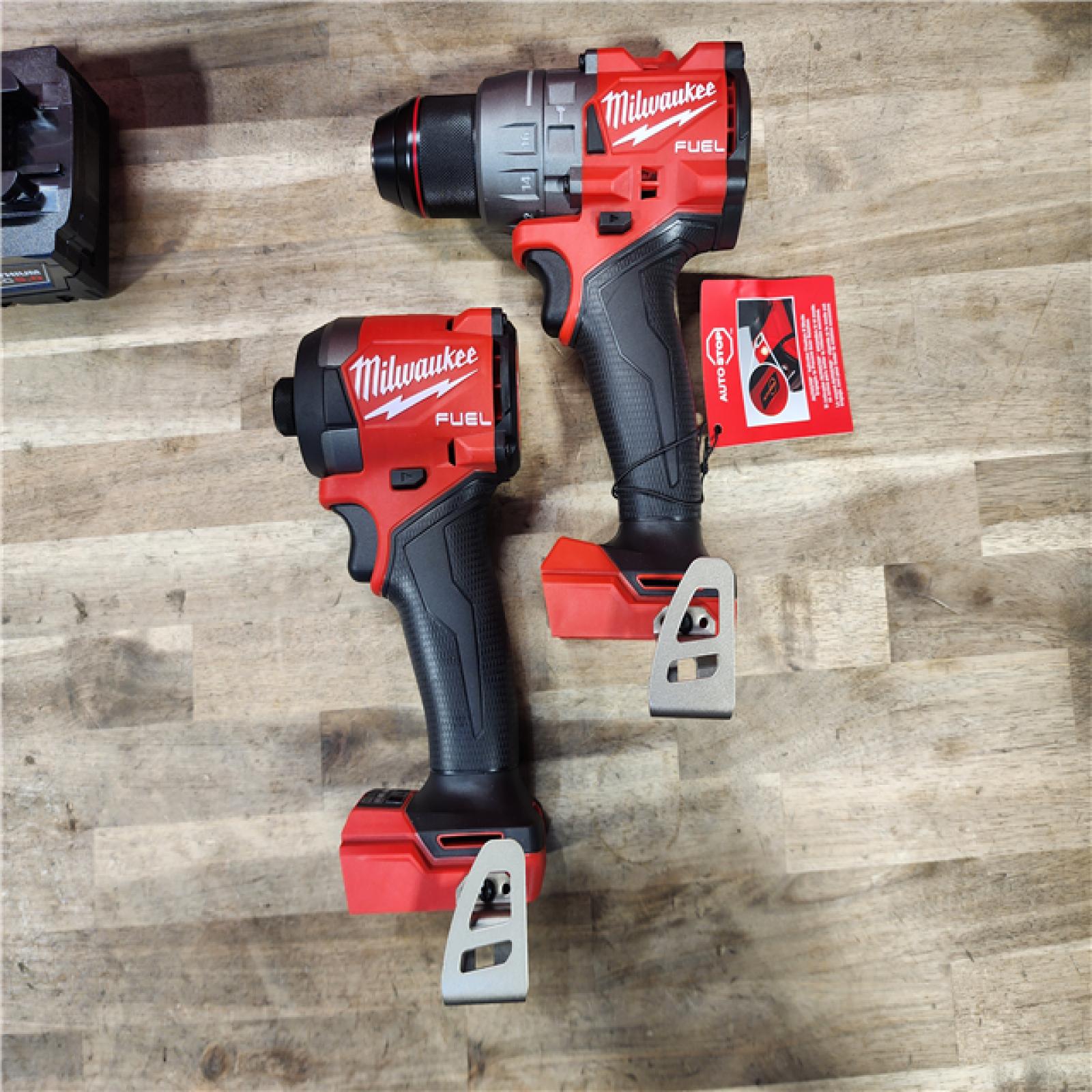 HOUSTON LOCATION - AS-IS (APPEARS LIKE NEW) MILWAUKEE FUEL 18V Lithium-Ion Brushless Cordless Hammer Drill and Impact Driver Combo Kit (2-Tool) with 2 Batteries