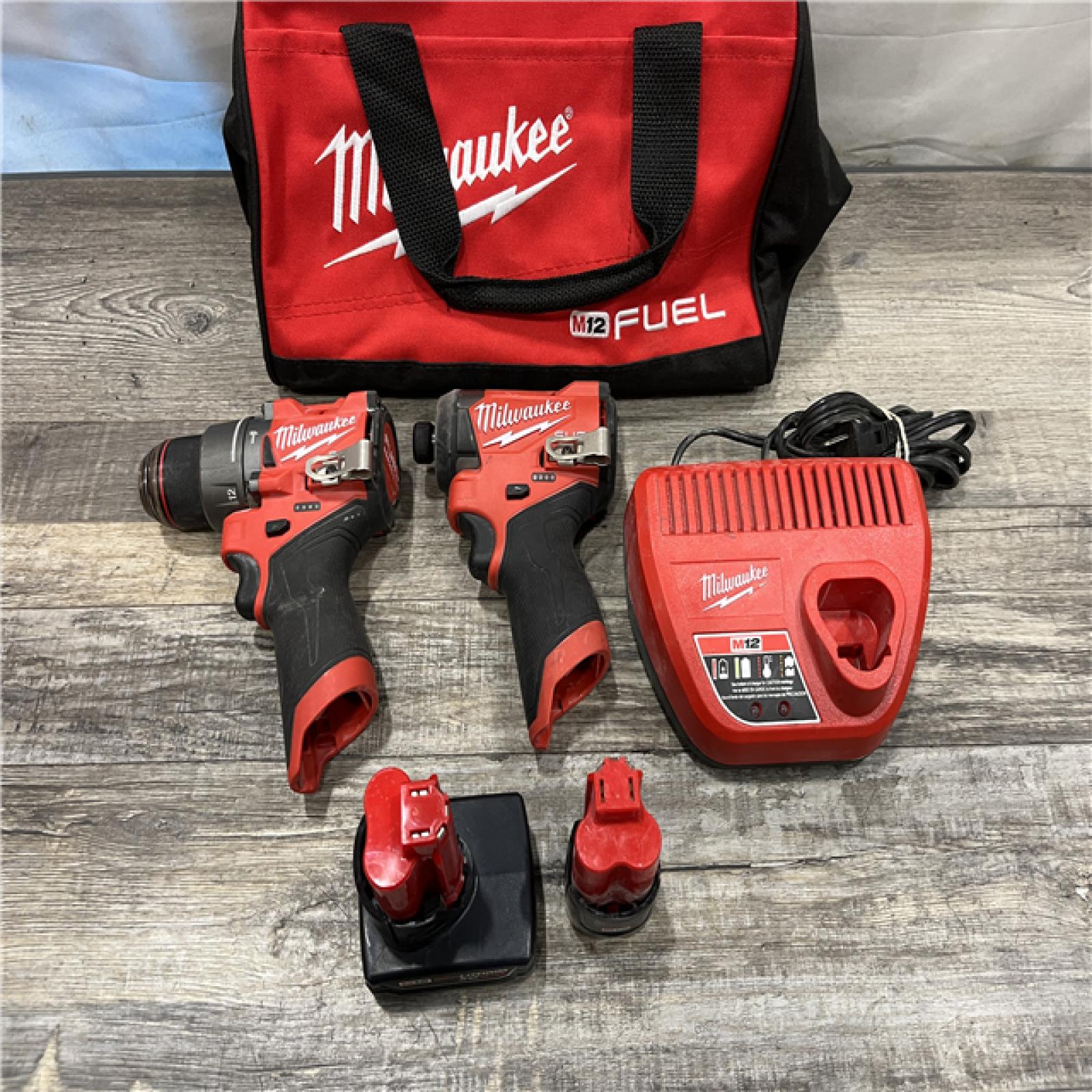 AS-IS Milwaukee FUEL 12-Volt Lithium-Ion Brushless Cordless Hammer Drill and Impact Driver Combo Kit