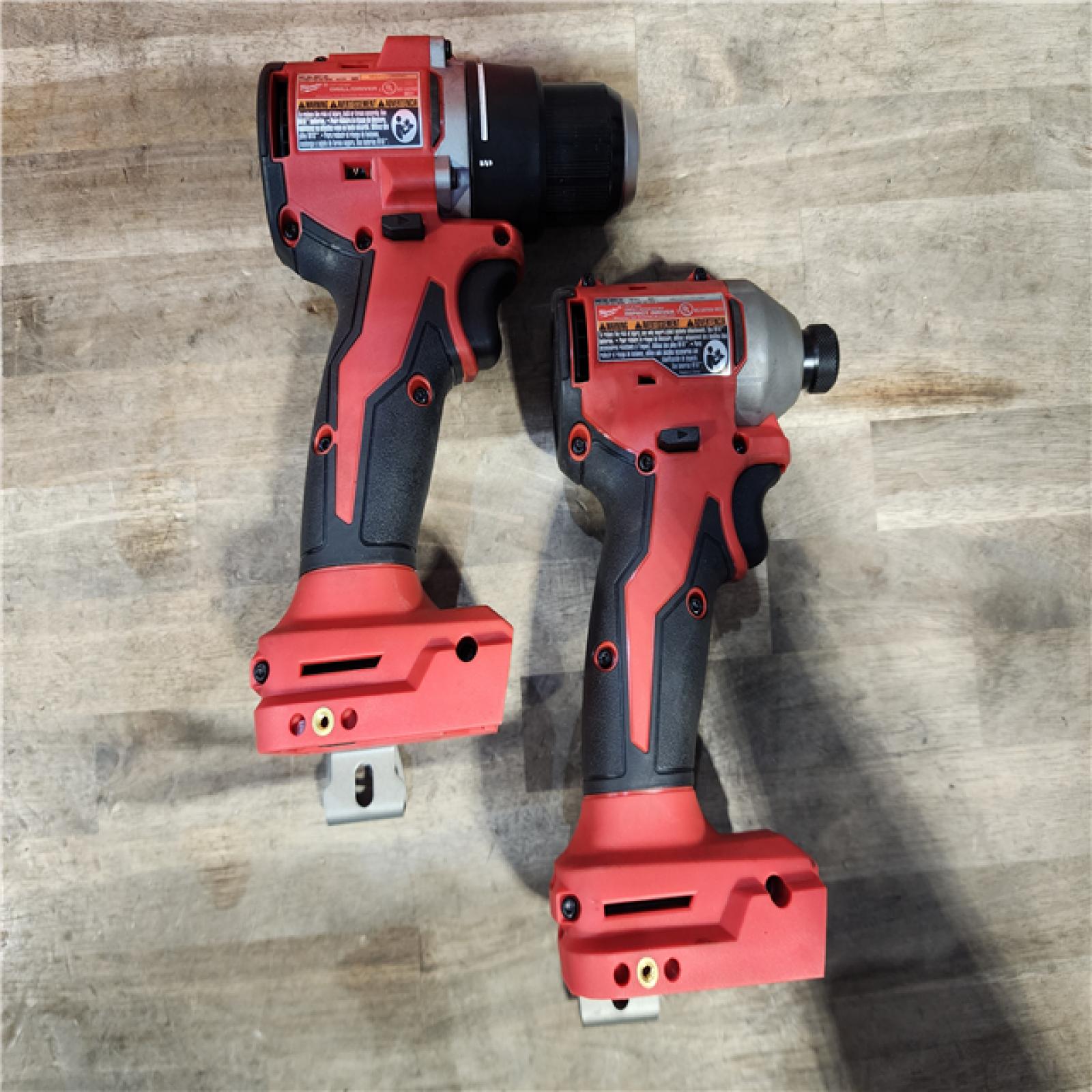 HOUSTON LOCATION - AS-IS Milwaukee M18 18V Lithium-Ion Brushless Cordless Compact Drill/Impact Combo Kit (2-Tool) W/(2) 2.0 Ah Batteries  Charger & Bag