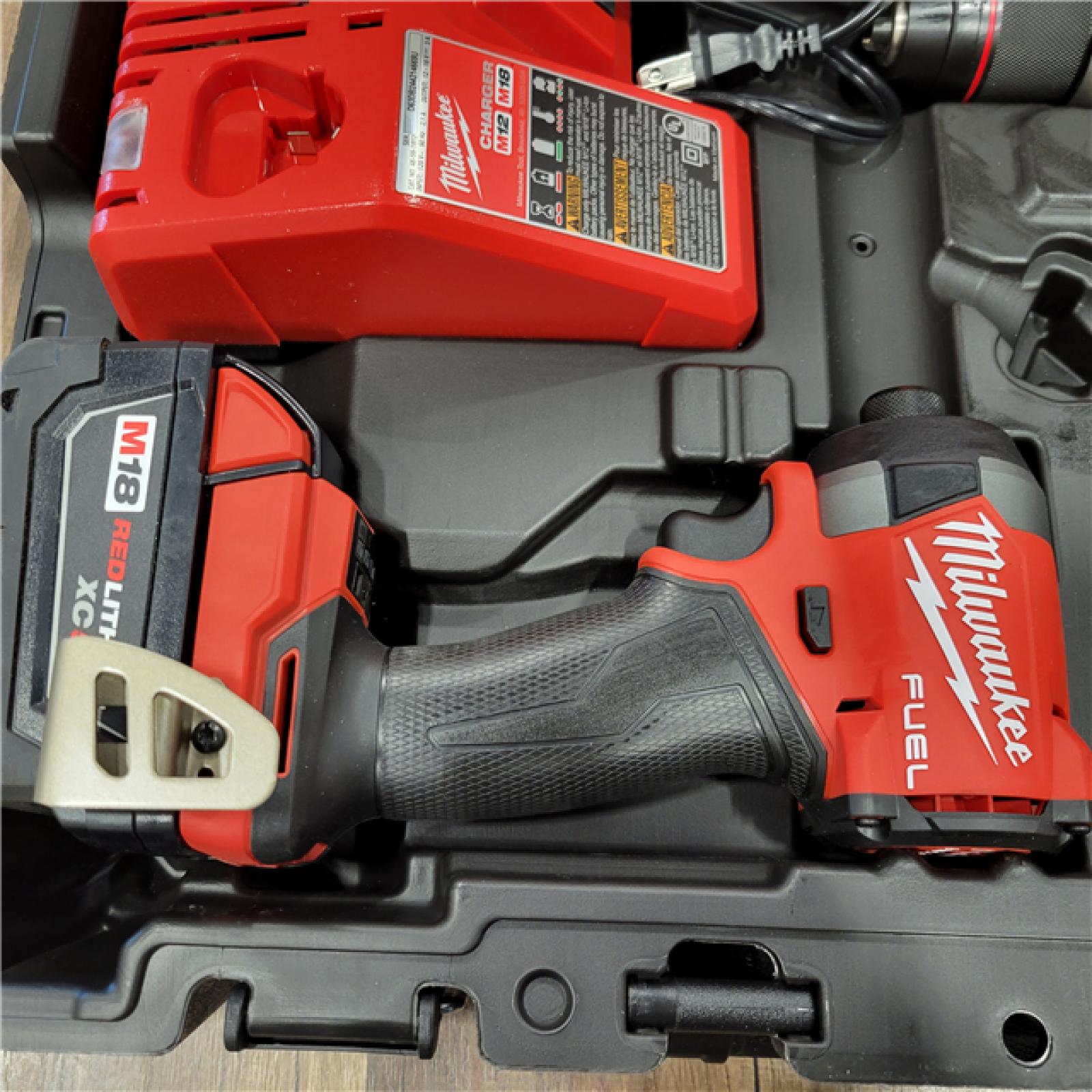 AS-IS MILWAUKEE M18 FUEL 18V Lithium-Ion Brushless Cordless Hammer Drill and Impact Driver Combo Kit (2-Tool) with 2 Batteries