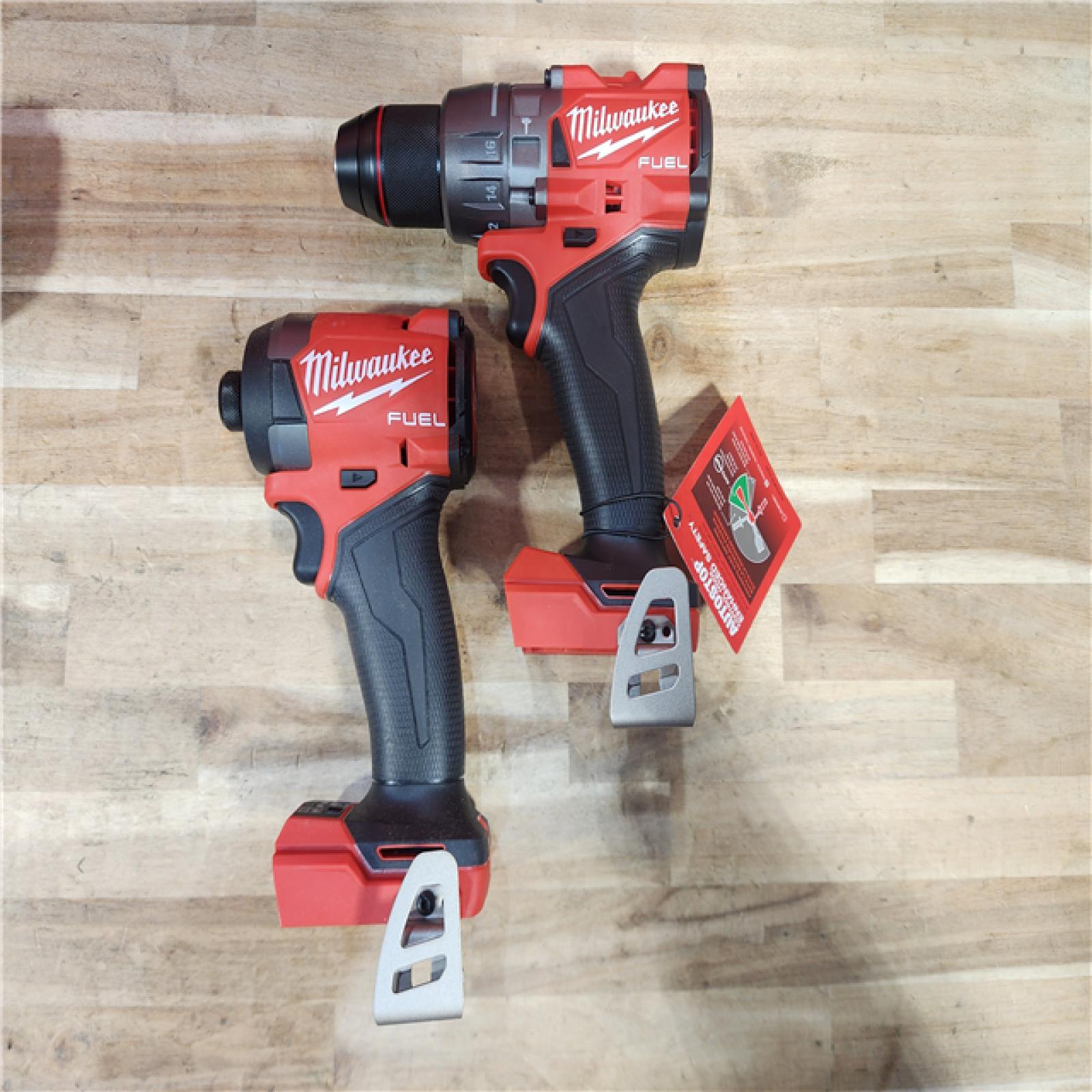 HOUSTON LOCATION - AS-IS (APPEARS LIKE NEW) Milwaukee  FUEL 18V Lithium-Ion Brushless Cordless Hammer Drill and Impact Driver Combo Kit