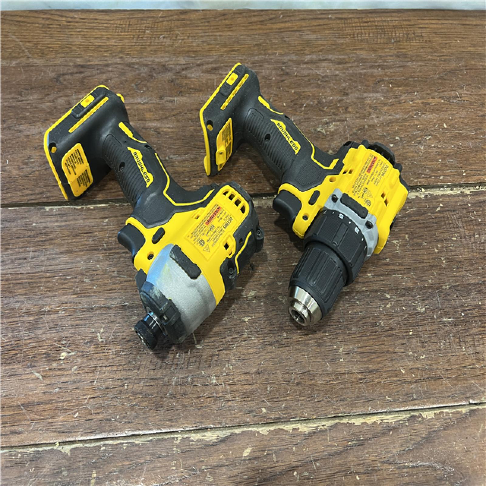 AS-IS Dewalt DCK225D2 20V MAX ATOMIC Brushless Compact Lithium-Ion 1/2 in. Cordless Drill Driver and 1/4 in. Impact Driver Combo Kit with 2 Batteries 2 Ah
