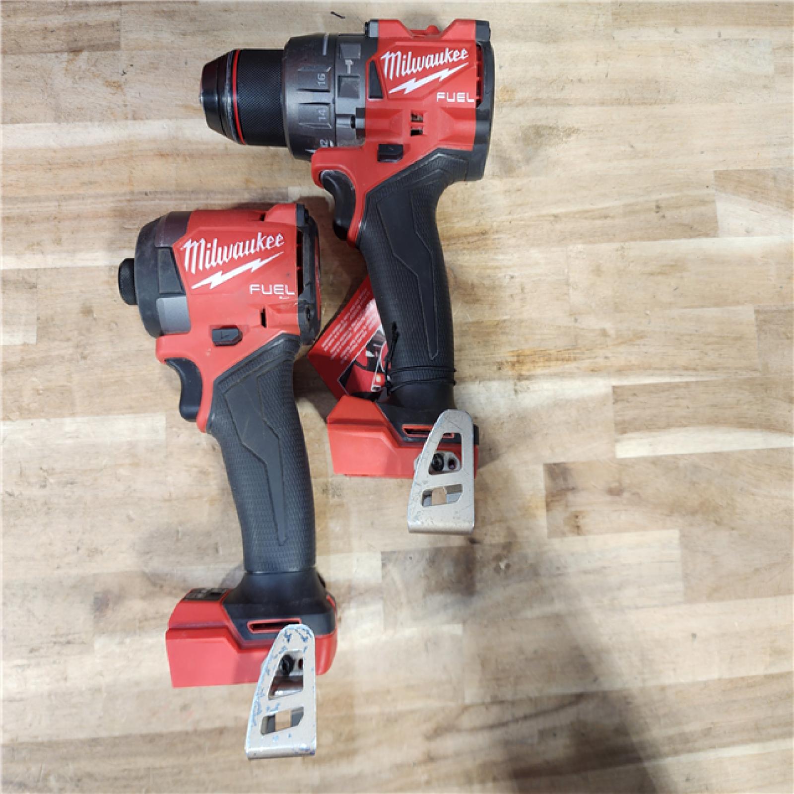 HOUSTON LOCATION - AS-IS Milwaukee FUEL 18V Lithium-Ion Brushless Cordless Hammer Drill and Impact Driver Combo Kit