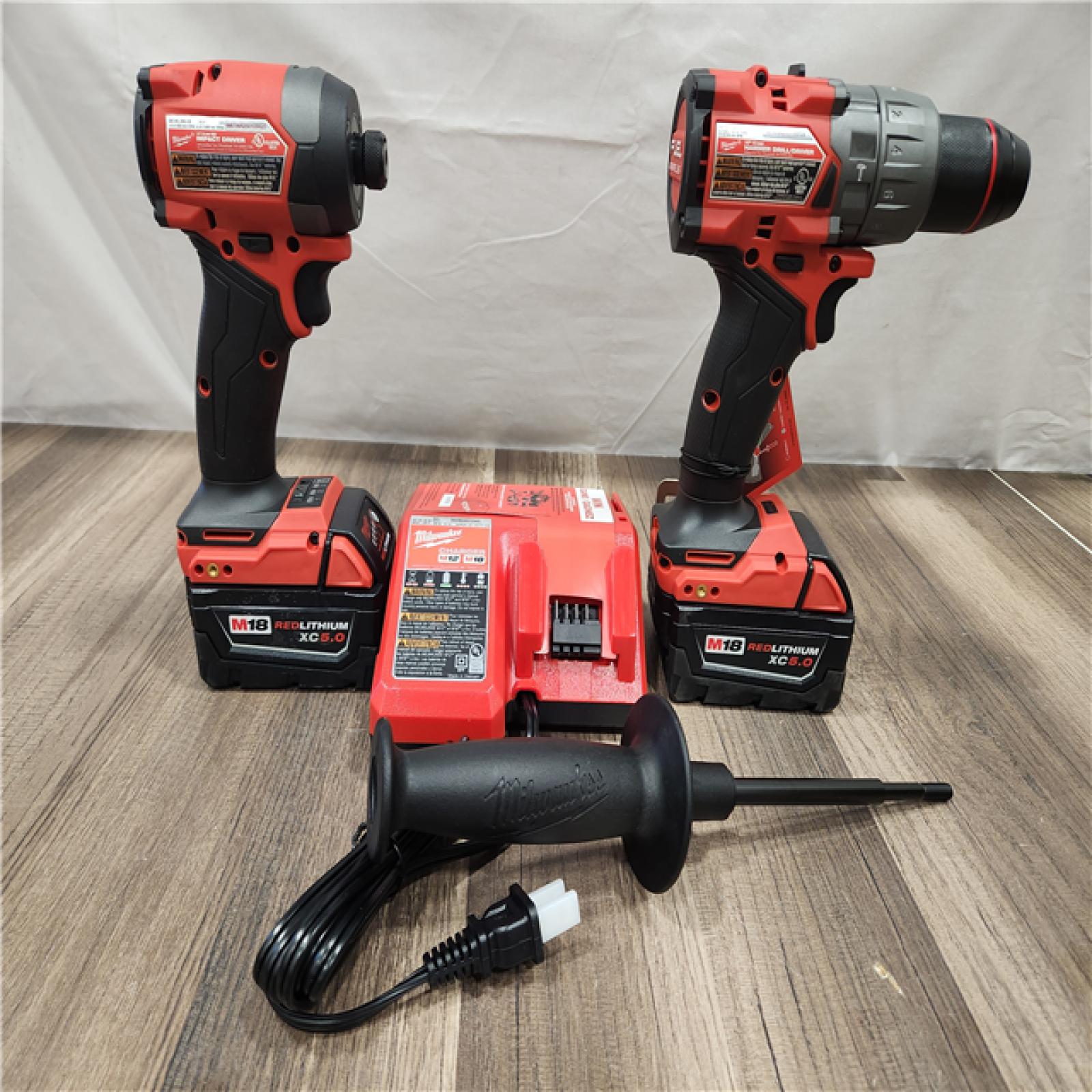 AS-IS- MILWAUKEE FUEL 18V Lithium-Ion Brushless Cordless Hammer Drill and Impact Driver Combo Kit
