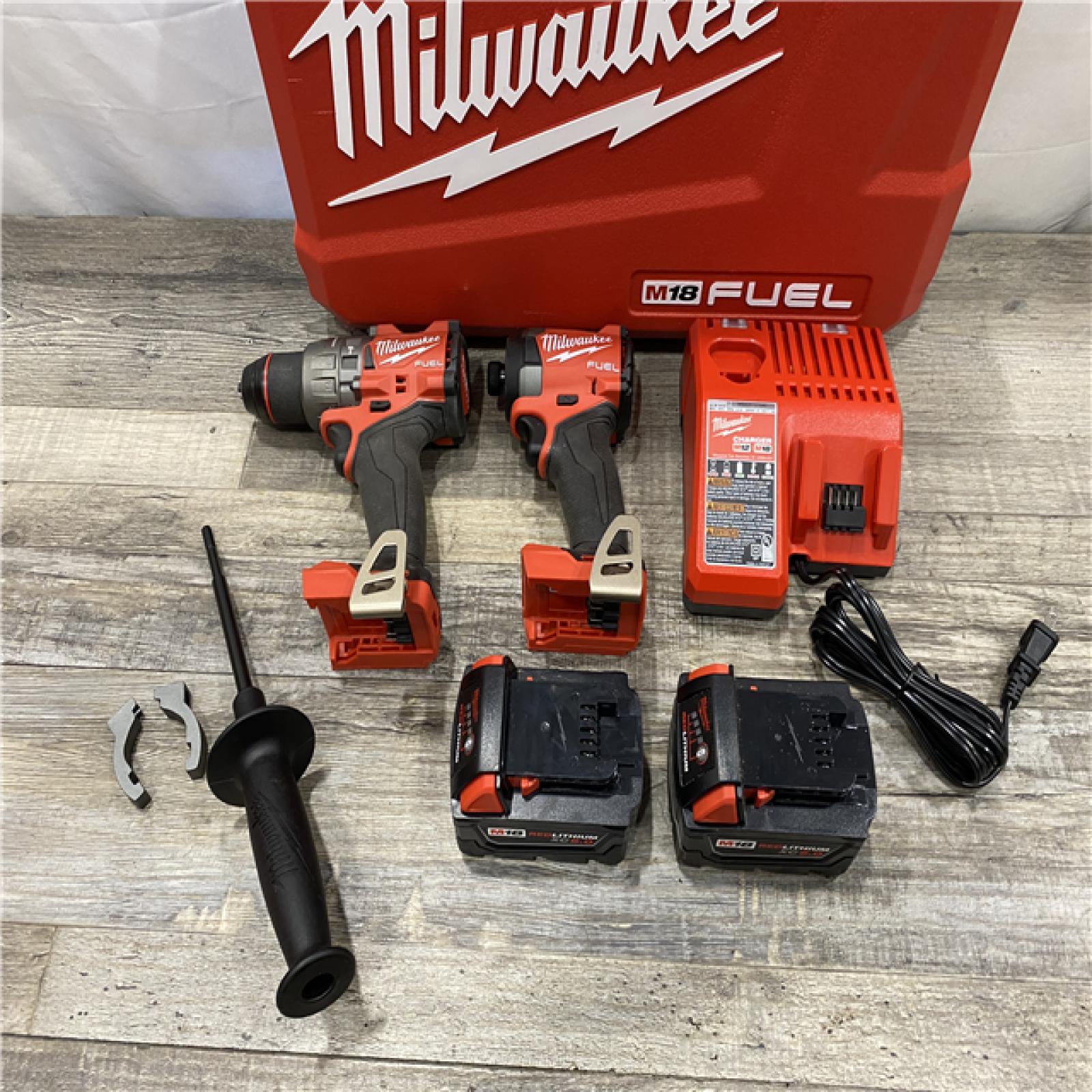AS-IS Milwaukee FUEL 18V Lithium-Ion Brushless Cordless Hammer Drill and Impact Driver Combo Kit