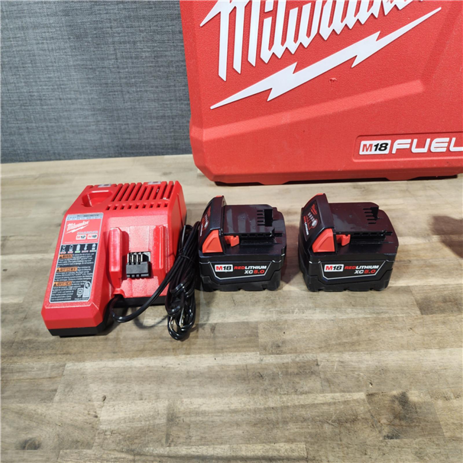 HOUSTON LOCATION - AS-IS (APPEARS LIKE NEW) MILWAUKEE M18 FUEL 18V Lithium-Ion Brushless Cordless Hammer Drill and Impact Driver Combo Kit (2-Tool) with 2 Batteries