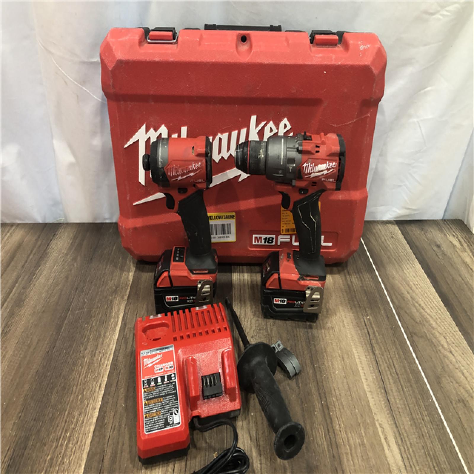 AS-IS Milwaukee FUEL 18V Lithium-Ion Brushless Cordless Hammer Drill and Impact Driver Combo Kit