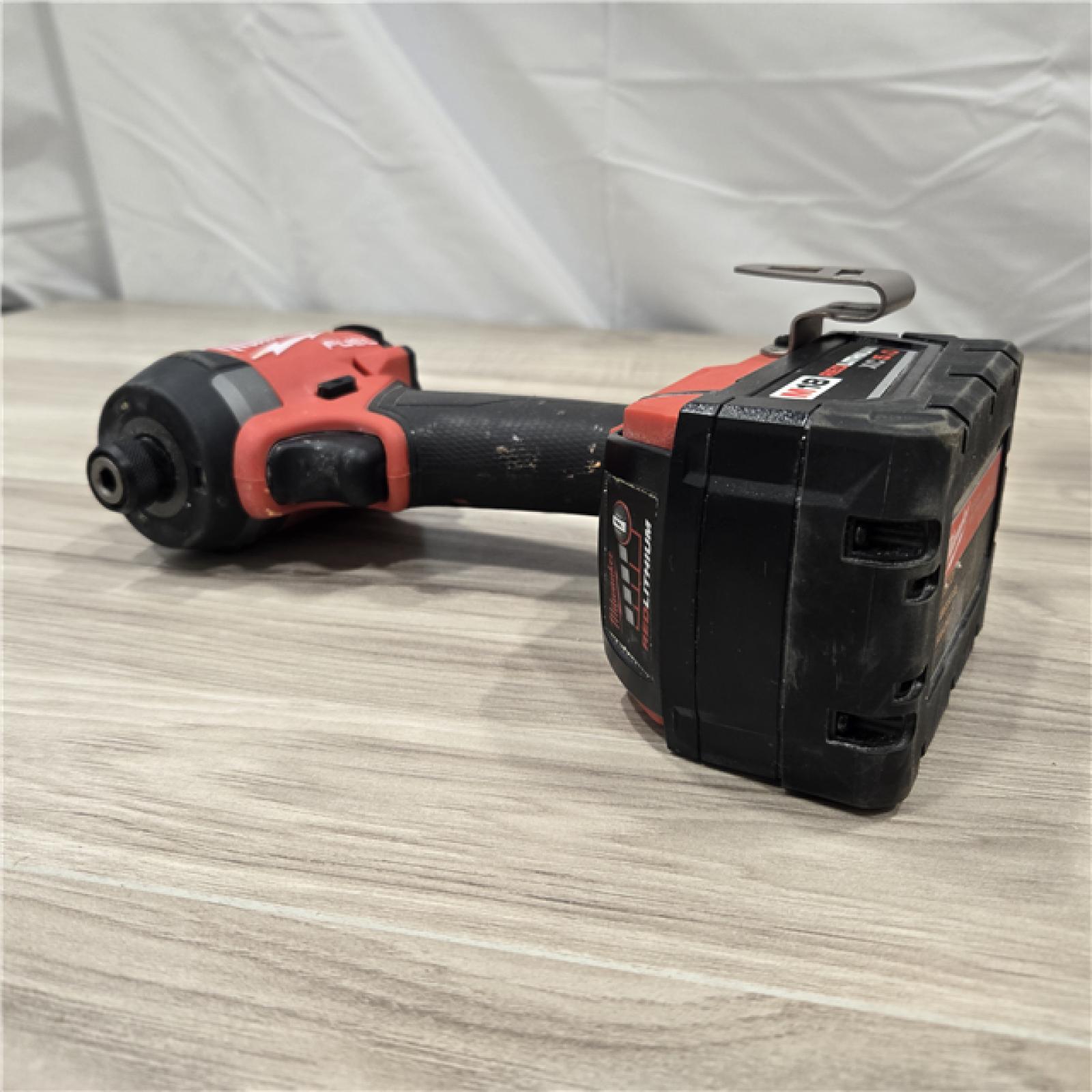 AS-IS MILWAUKEE FUEL 18V Lithium-Ion Brushless Cordless Hammer Drill and Impact Driver Combo Kit (2-Tool) with 2 Batteries