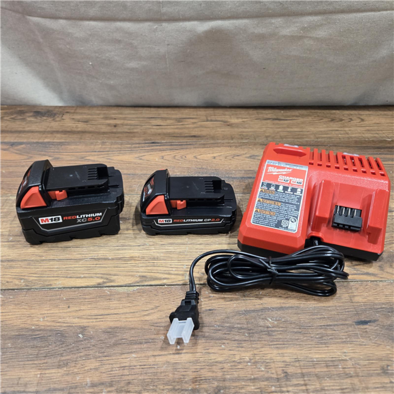 AS-IS Milwaukee M18 18-Volt Lithium-Ion Starter Kit with One 5.0 Ah and One 2.0 Ah Battery and Charger