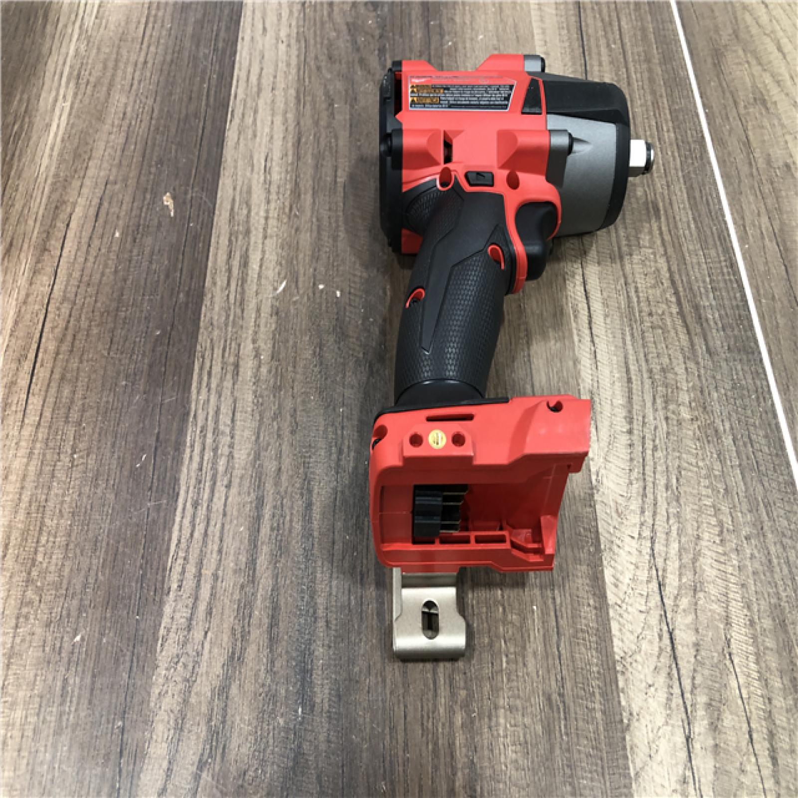 AS-IS Milwaukee  FUEL Gen-2 18V Lithium-Ion Brushless Cordless Mid Torque 1/2 in. Impact Wrench w/Friction Ring (Tool-Only)