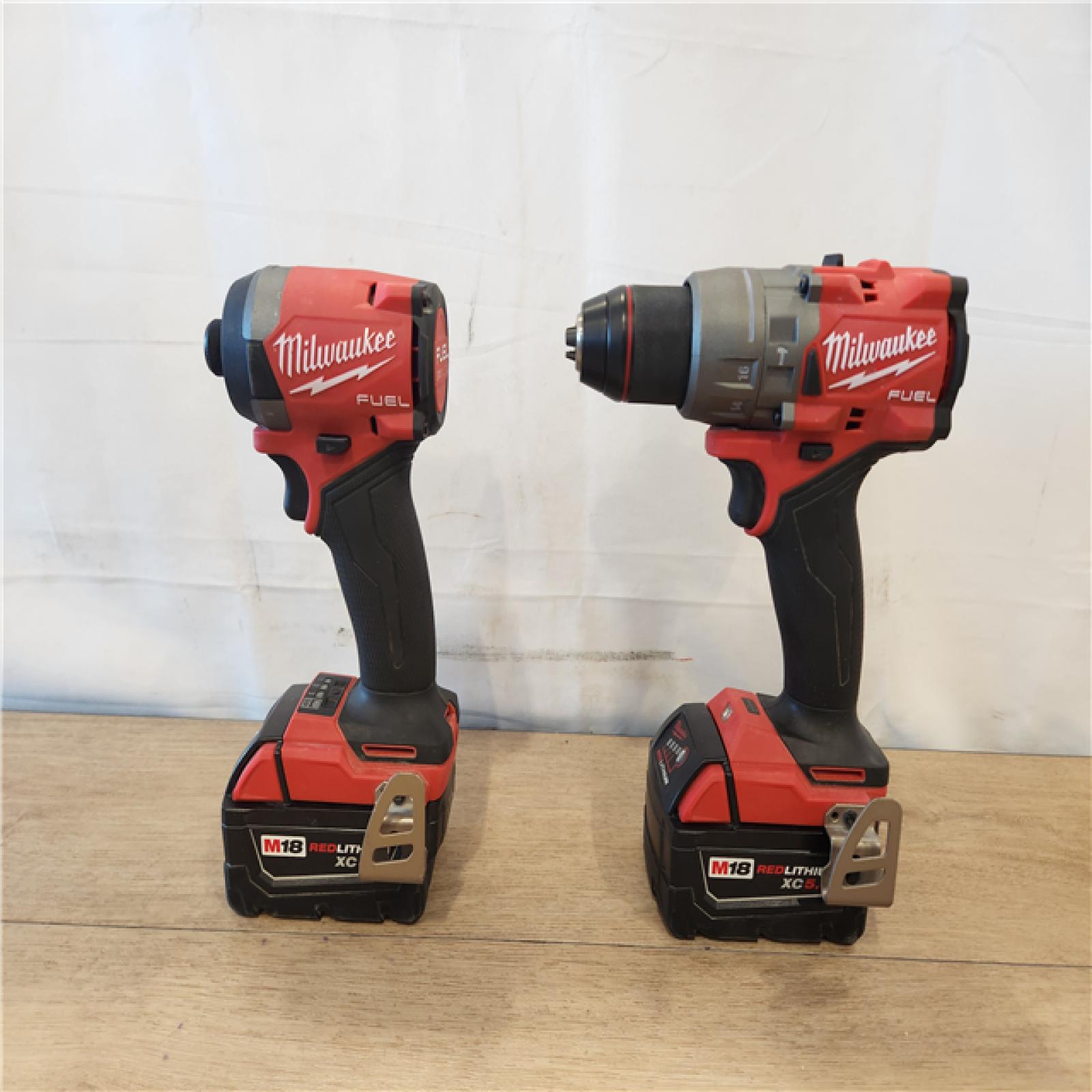 AS-IS- Milwaukee FUEL 18V Lithium-Ion Brushless Cordless Hammer Drill and Impact Driver Combo Kit