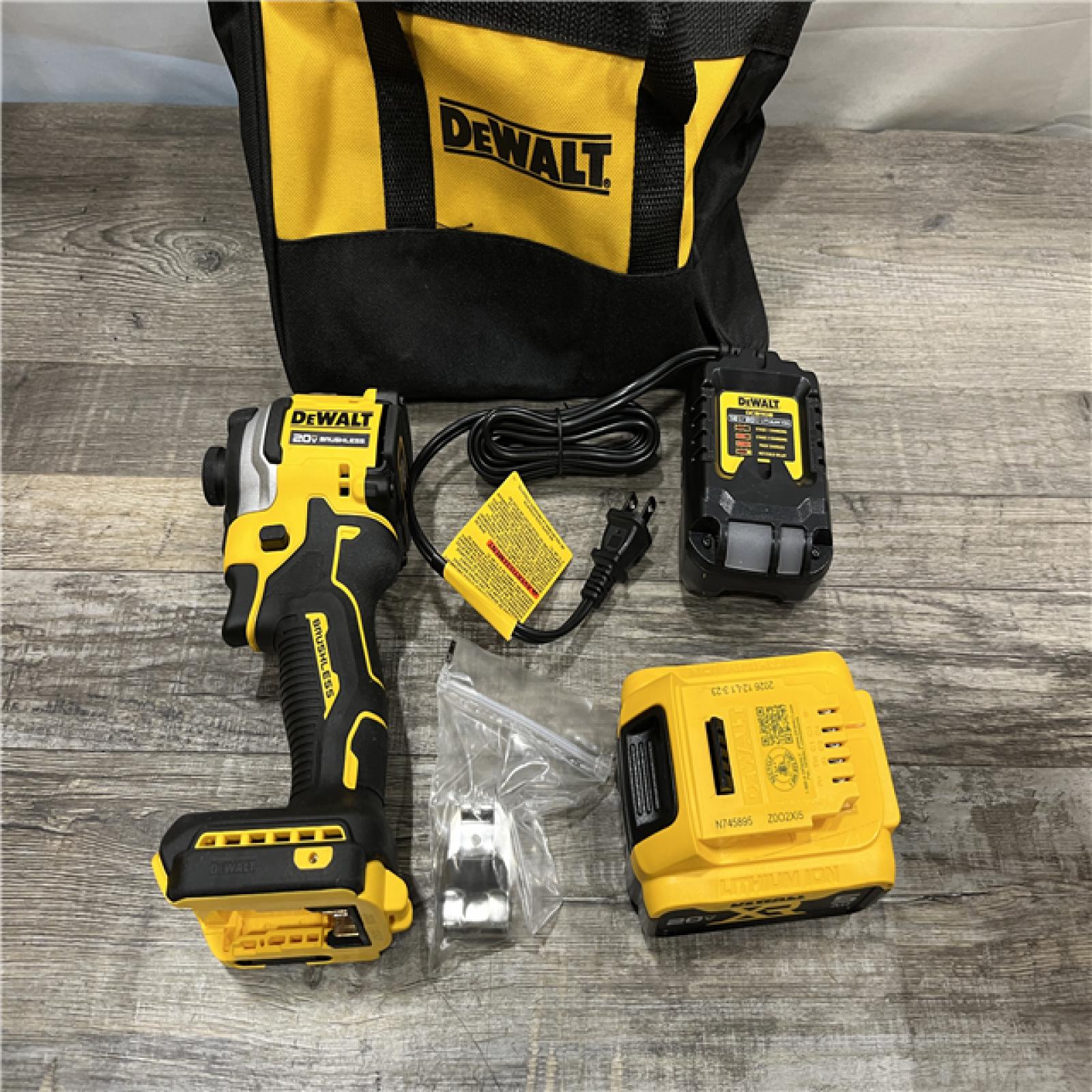 AS-IS DEWALT ATOMIC 20V MAX Lithium-Ion Cordless 1/4 in. Brushless Impact Driver Kit