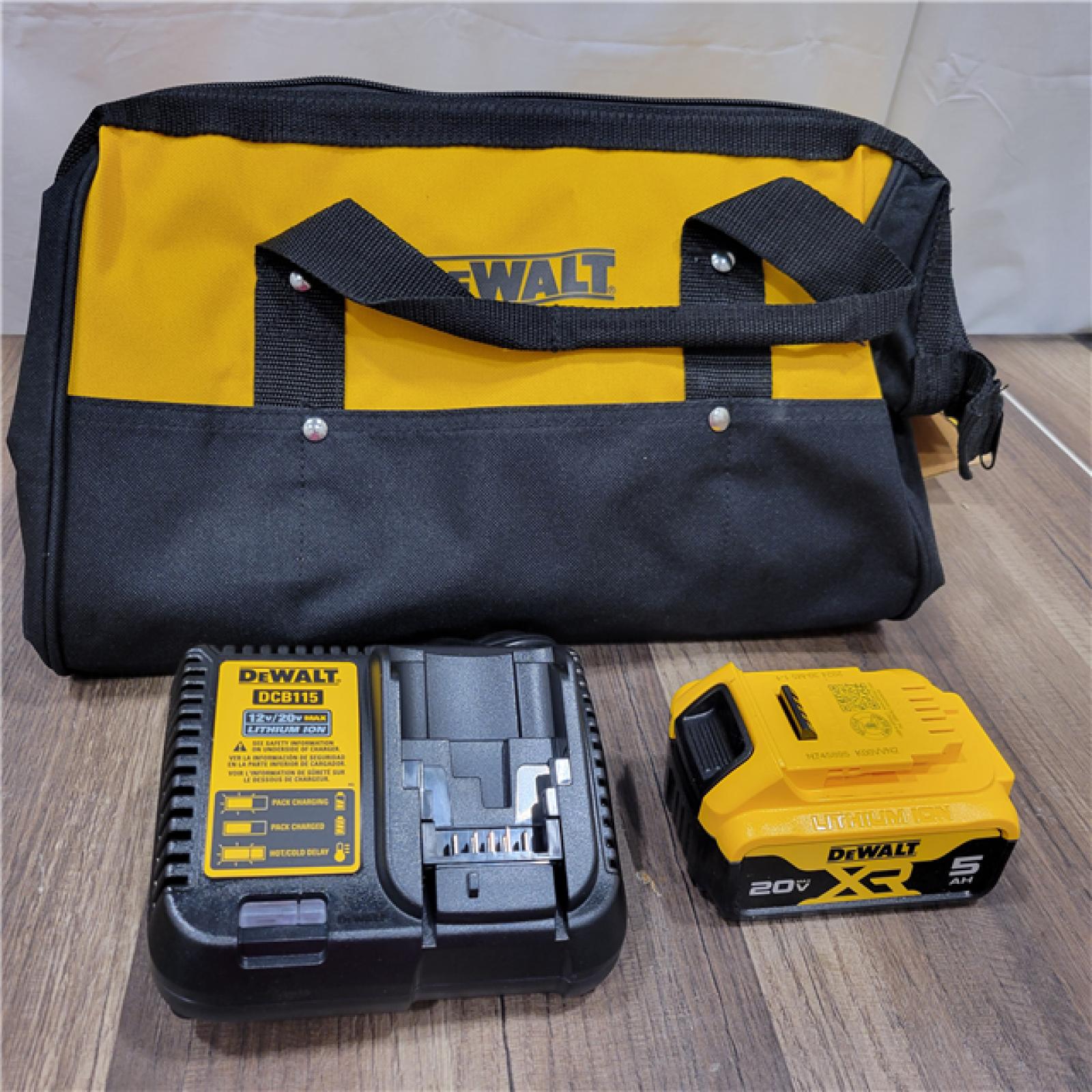 AS-IS DEWALT 20-Volt MAX XR Lithium-Ion Starter Kit with Premium Battery Pack 5.0Ah, Charger and Kit Bag
