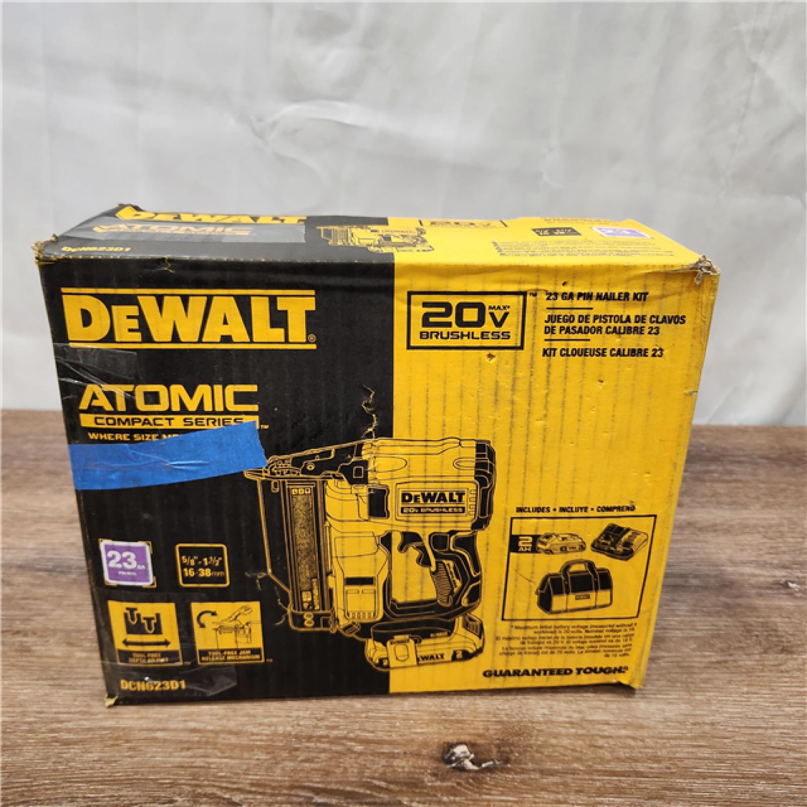 AS-IS DEWALT ATOMIC 20V MAX Lithium Ion Cordless 23 Gauge Pin Nailer Kit with 2.0Ah Battery & charge