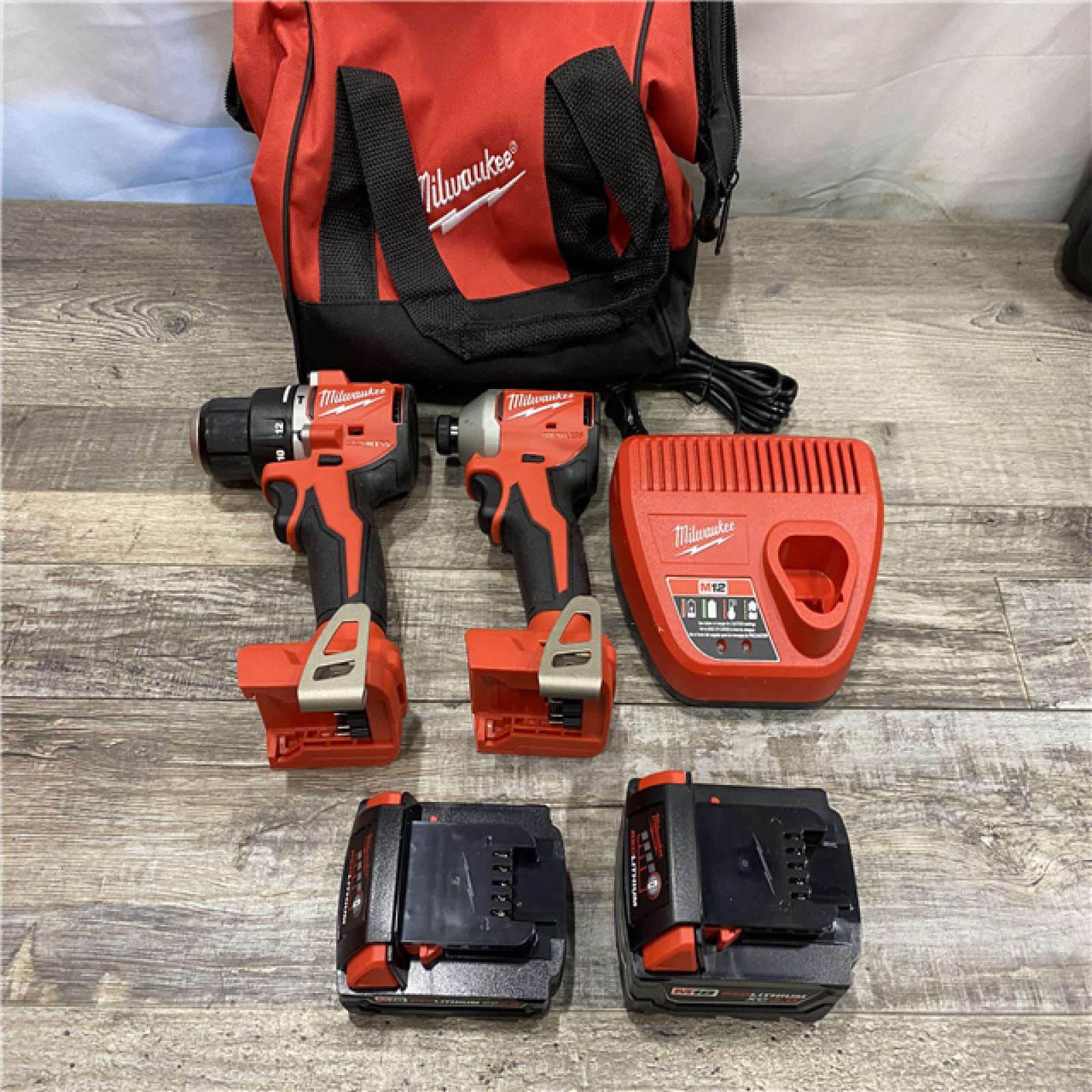 AS-IS Milwaukee 18-Volt Lithium-Ion Brushless Cordless Compact Hammer Drill/Impact Combo Kit