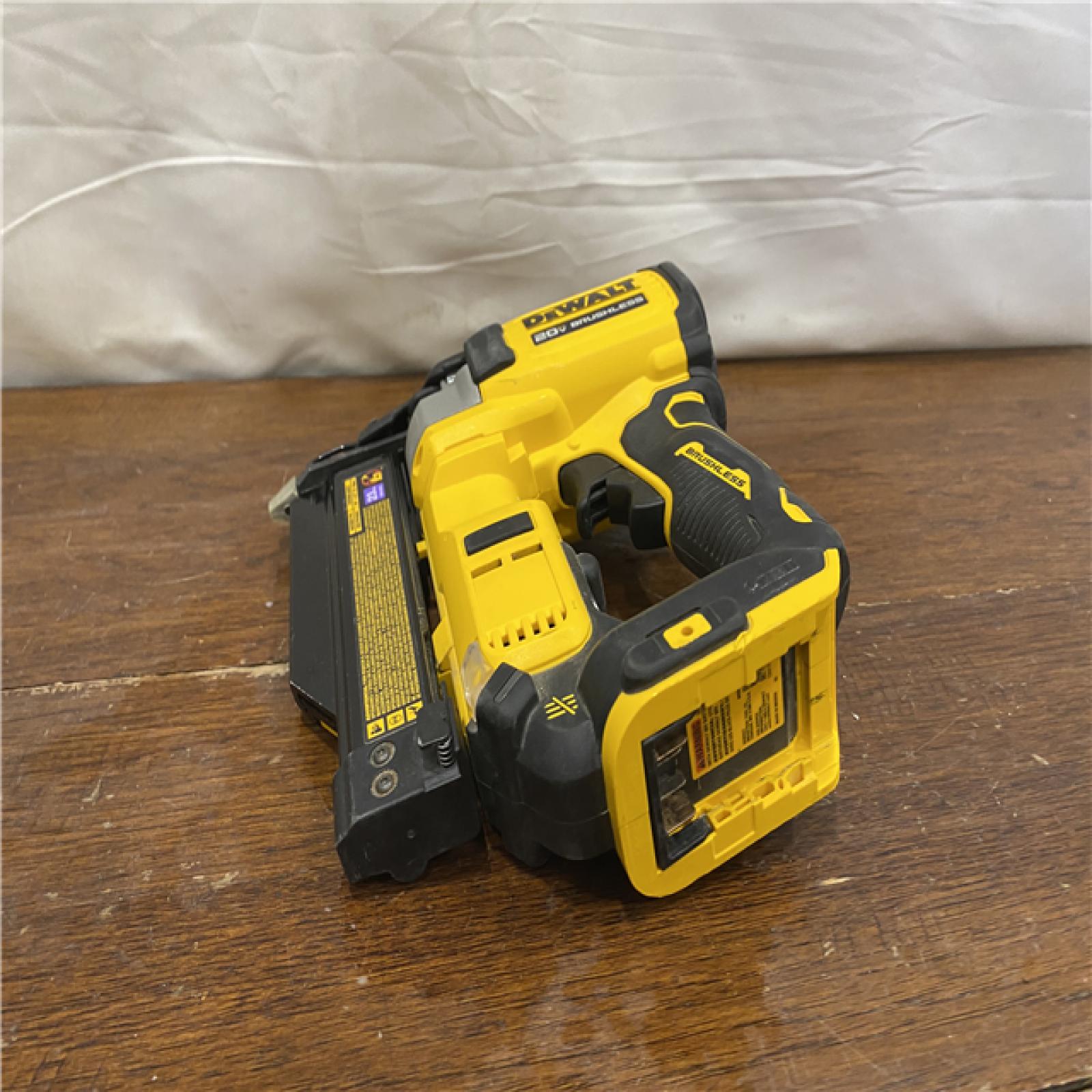 AS-IS DEWALT ATOMIC 20V MAX Lithium Ion Cordless 23 Gauge Pin Nailer Kit with 3.0Ah Battery and Charger