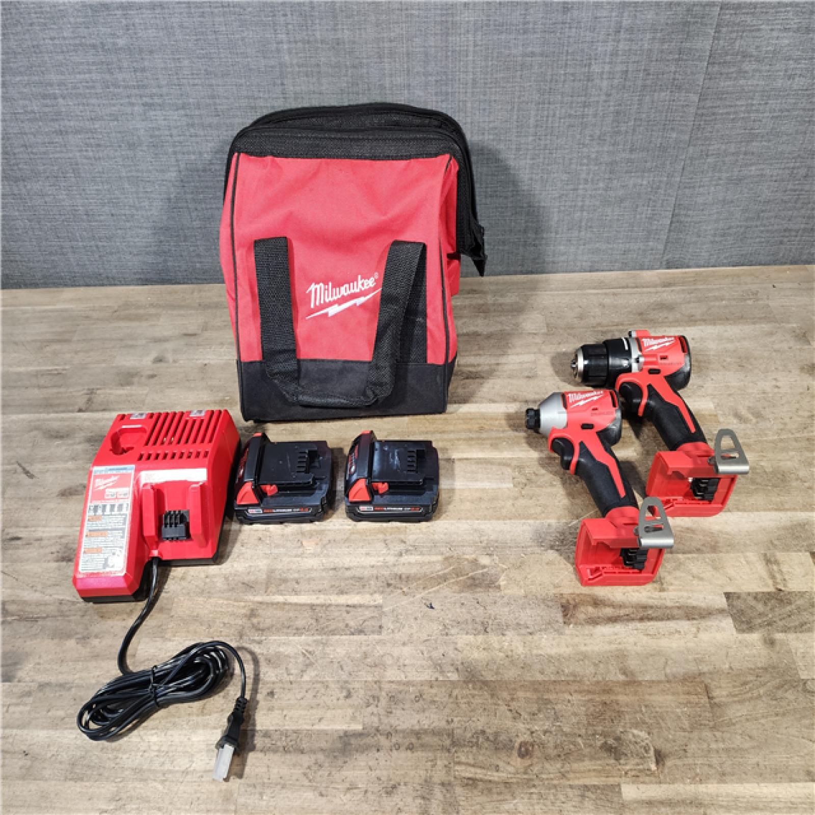 HOUSTON LOCATION - AS-IS M18 18-Volt Lithium-Ion Brushless Cordless Compact Hammer Drill/Impact Combo Kit (2-Tool) with (2) Batteries  Bag