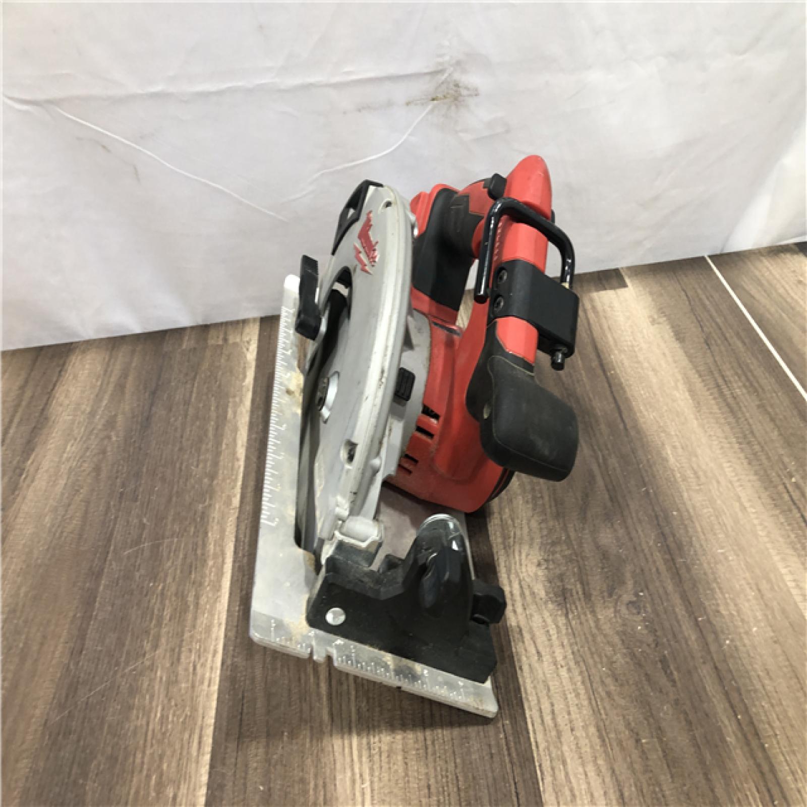 AS-IS Milwaukee FUEL 18V Lithium-Ion Brushless Cordless 6-1/2 in. Circular Saw (Tool-Only)