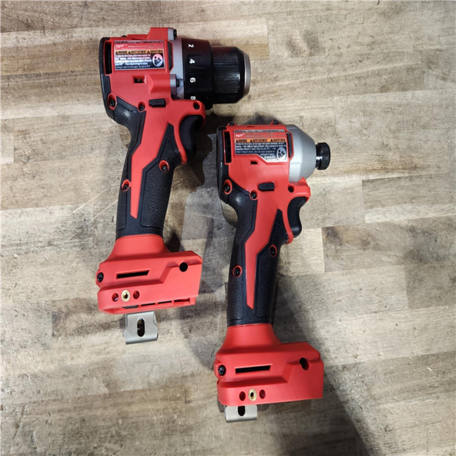HOUSTON LOCATION - AS-IS Milwaukee M18 18V Lithium-Ion Brushless Cordless Compact Drill/Impact Combo Kit (2-Tool) W/(2) 2.0 Ah Batteries  Charger & Bag