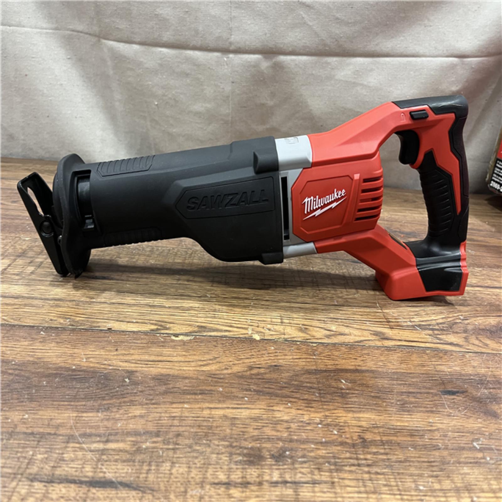 AS-IS MILWAUKEE M18 18V Lithium-Ion Cordless Combo Tool Kit with Two 3.0Ah Batteries, 1-Charger, 1-Tool Bag (4-Tool)