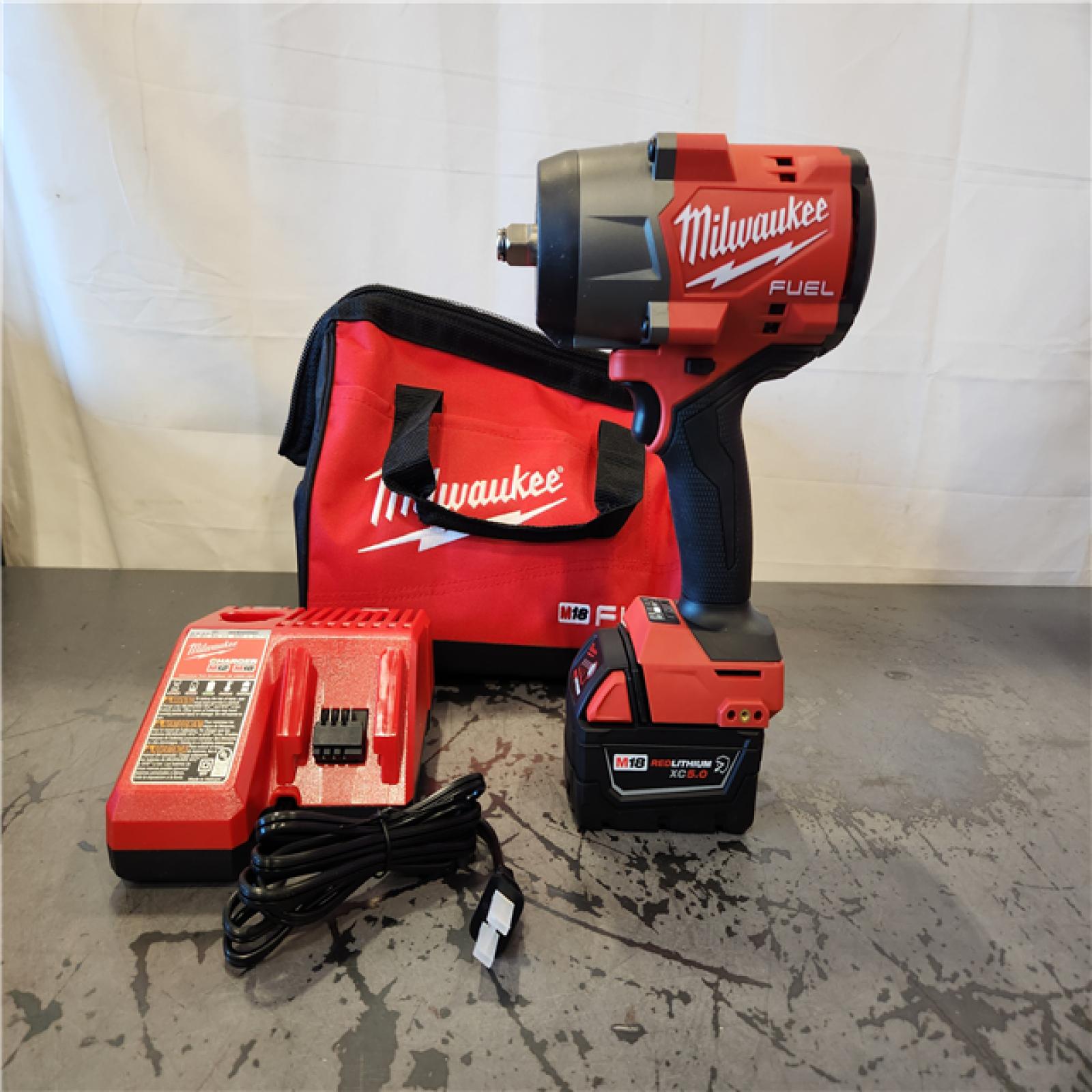 AS-IS- Milwaukee M18 1/2 in. Cordless Brushless High Torque Impact Wrench Kit (Battery & Charger)