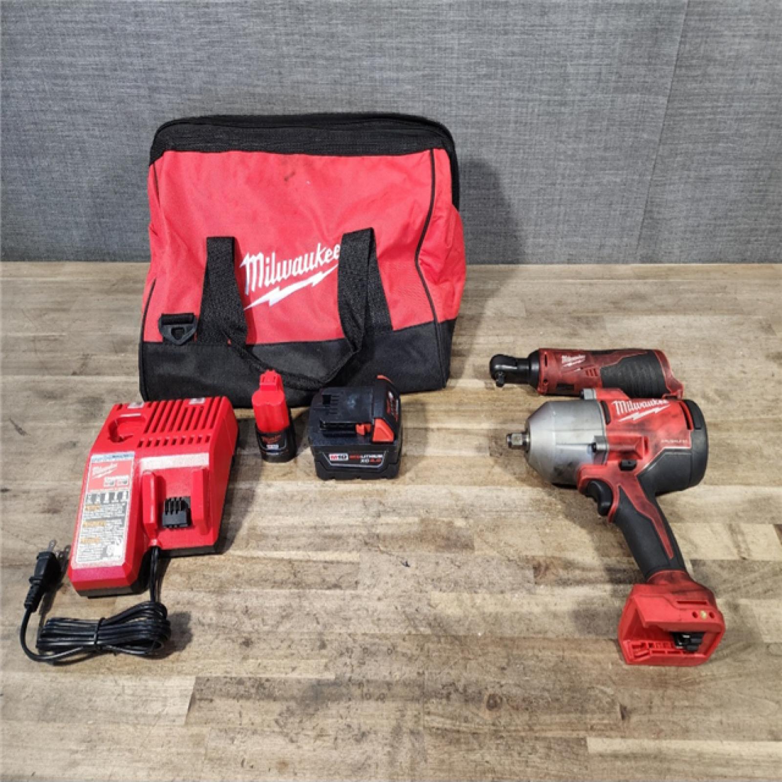 HOUSTON LOCATION - AS-IS Milwaukee M12/M18 12/18V Lithium-Ion Cordless 3/8 in. Ratchet and 1/2 in. High Torque Impact Wrench with Friction Ring Combo Kit