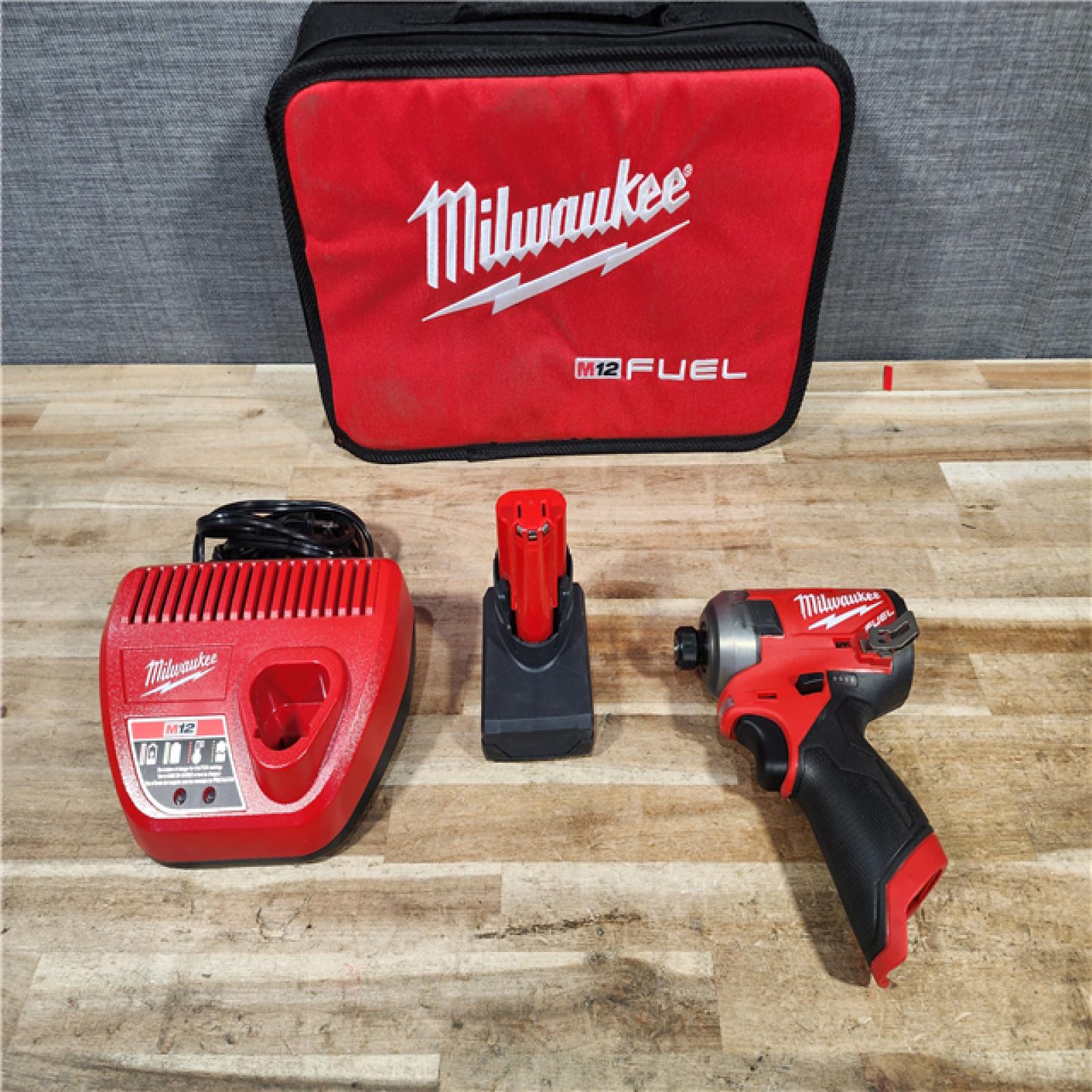 HOUSTON LOCATION - AS - IS Milwaukee FUEL SURGE 12V Lithium-Ion Brushless Cordless 1/4 in. Hex Impact Driver Compact Kit
