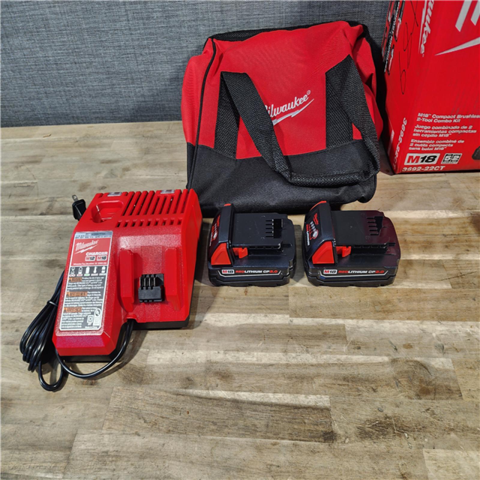 HOUSTON LOCATION - AS-IS Milwaukee M18 18V Lithium-Ion Brushless Cordless Compact Drill/Impact Combo Kit (2-Tool) W/(2) 2.0 Ah Batteries, Charger & Bag