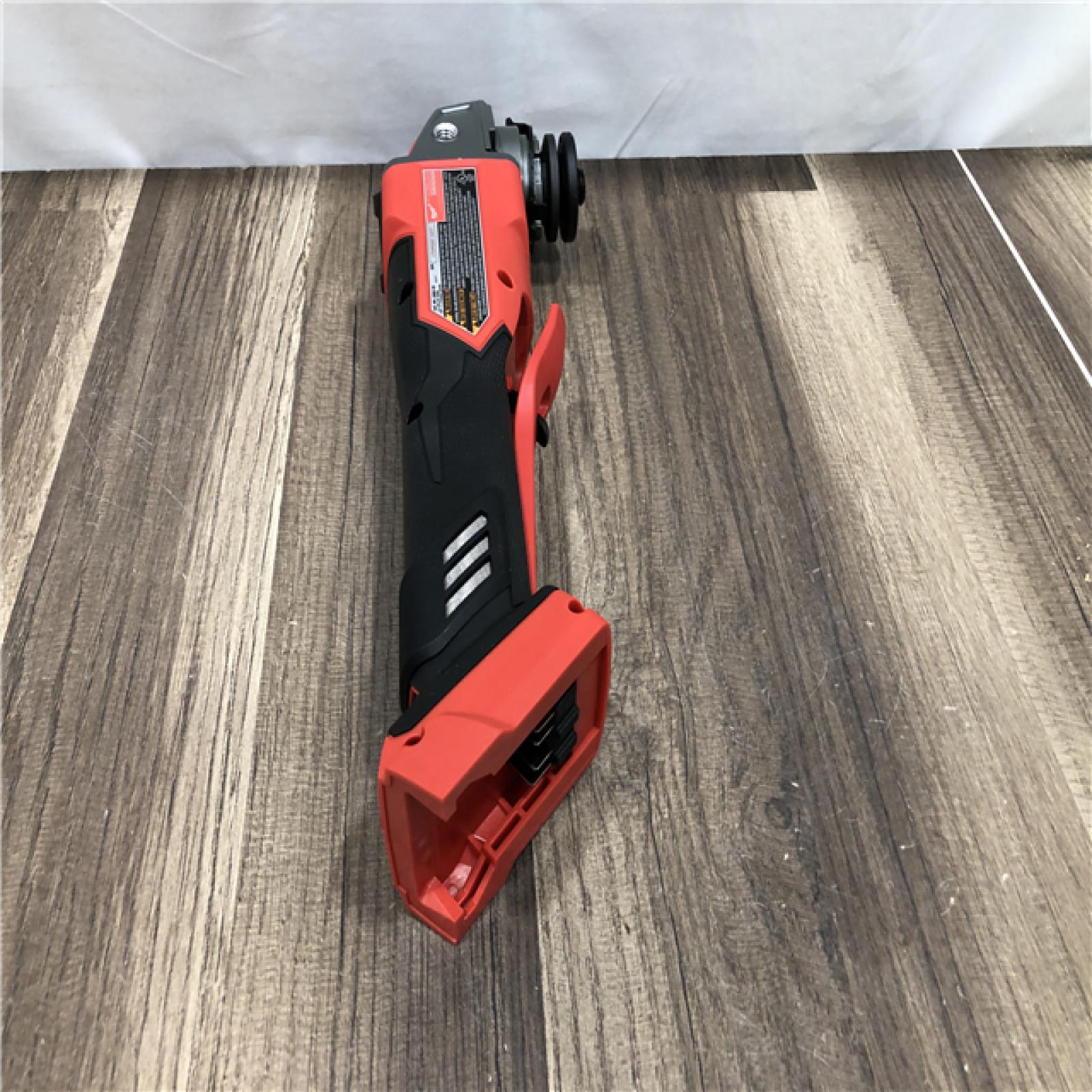 AS-IS Milwaukee FUEL 18V Lithium-Ion Brushless Cordless 4-1/2 in./5 in. Grinder with Variable Speed & Paddle Switch (Tool-Only)