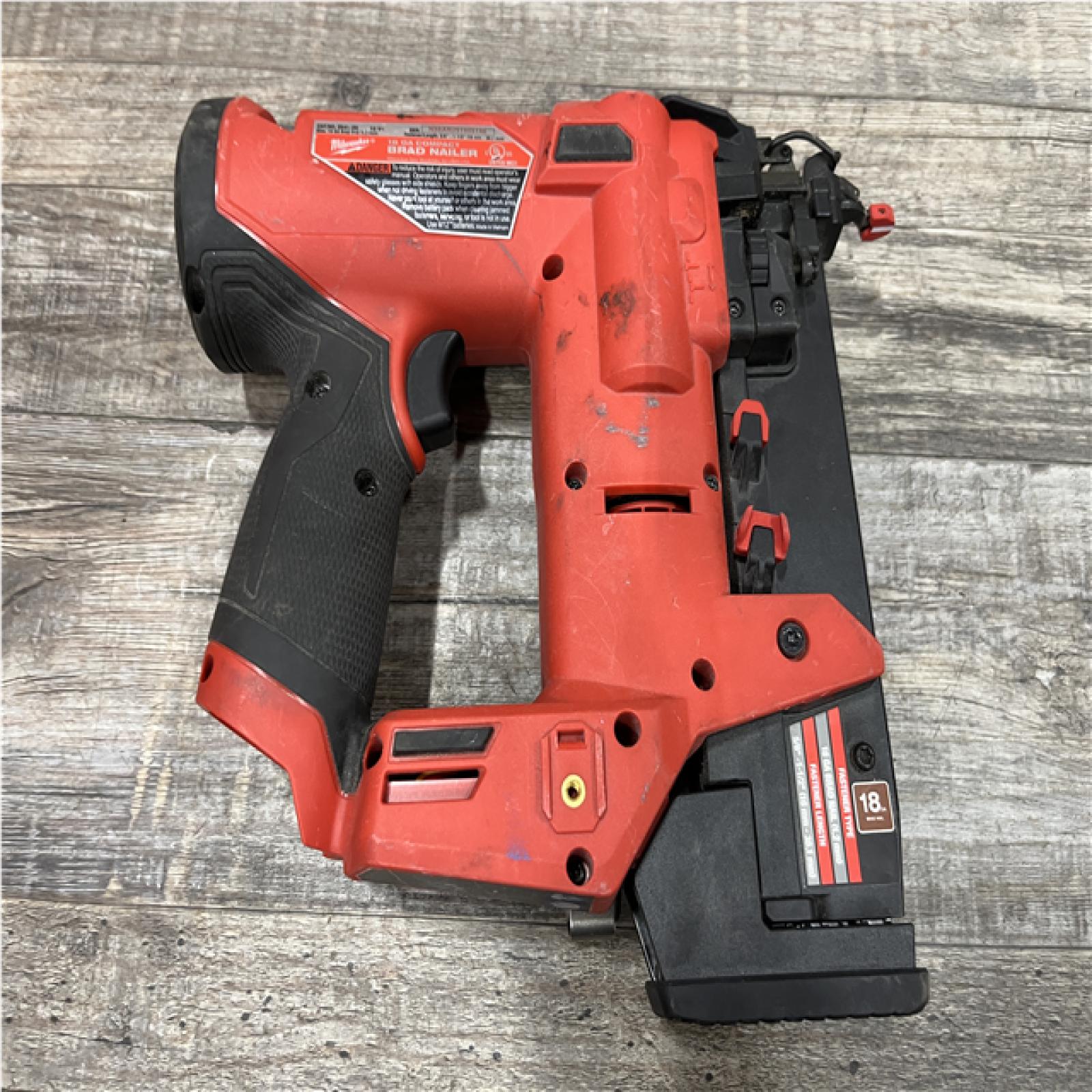 AS-IS Milwaukee FUEL 12-Volt Lithium-Ion Brushless Cordless 18-Gauge 1-1/2 in. Compact Brad Nailer (Tool Only)